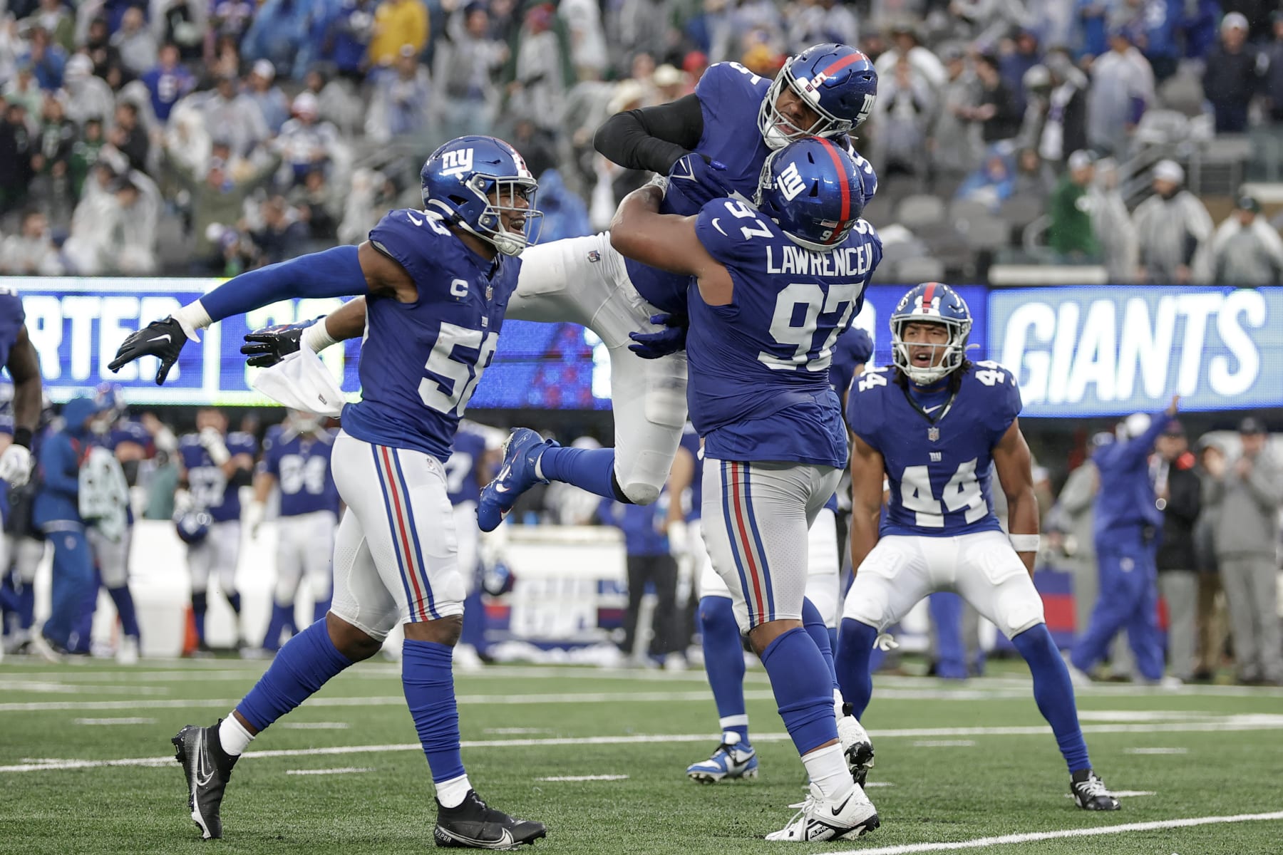 New York Giants outside linebacker Kayvon Thibodeaux (5) celebrates after sacking New York Jets quarterback Zach Wilson (2) during the second half of an NFL football game, Sunday, Oct. 29, 2023, in East Rutherford, N.J. (AP Photo/Adam Hunger)