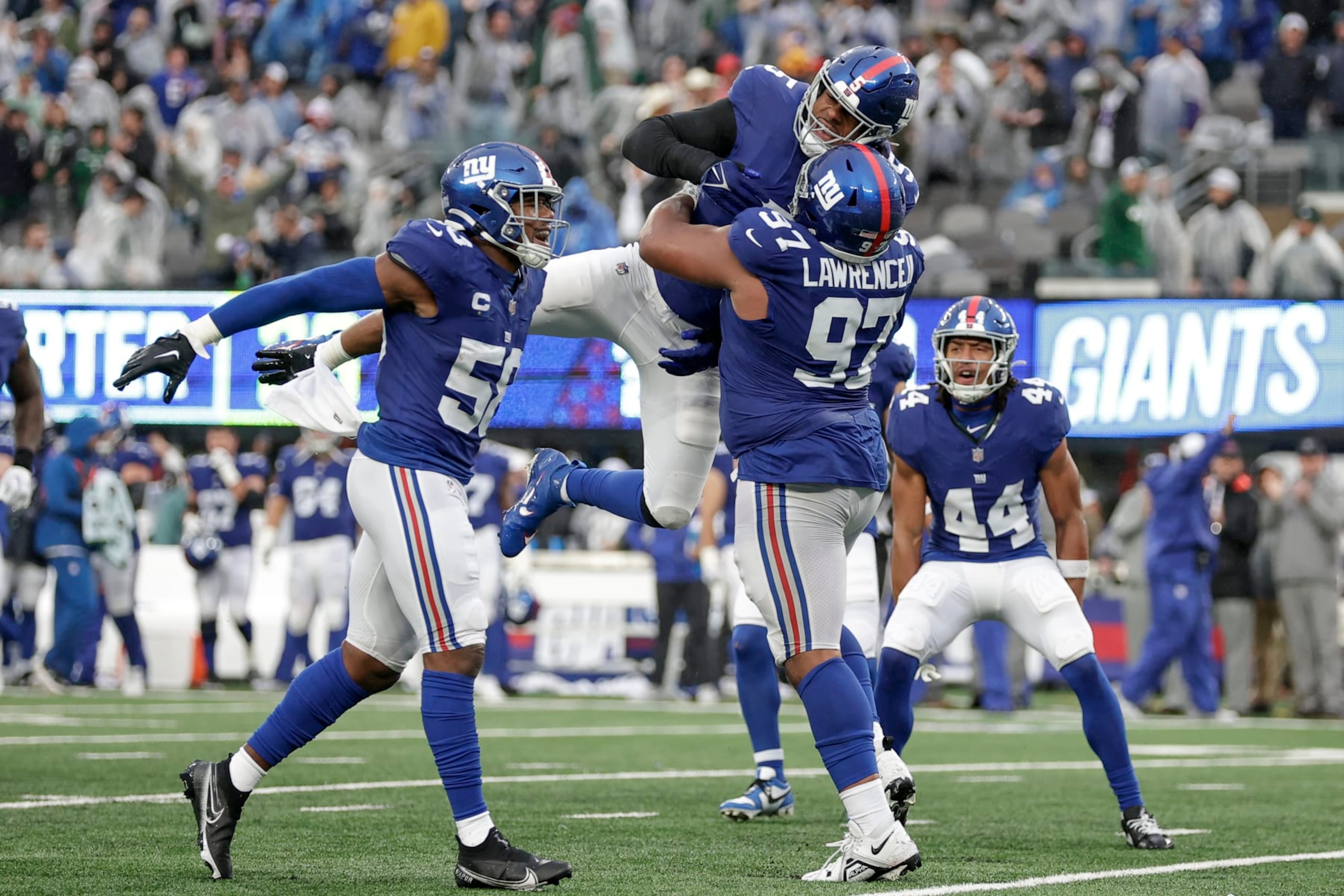 New York Giants outside linebacker Kayvon Thibodeaux (5) celebrates after sacking New York Jets quarterback Zach Wilson (2) during the second half of an NFL football game, Sunday, Oct. 29, 2023, in East Rutherford, N.J. (AP Photo/Adam Hunger)