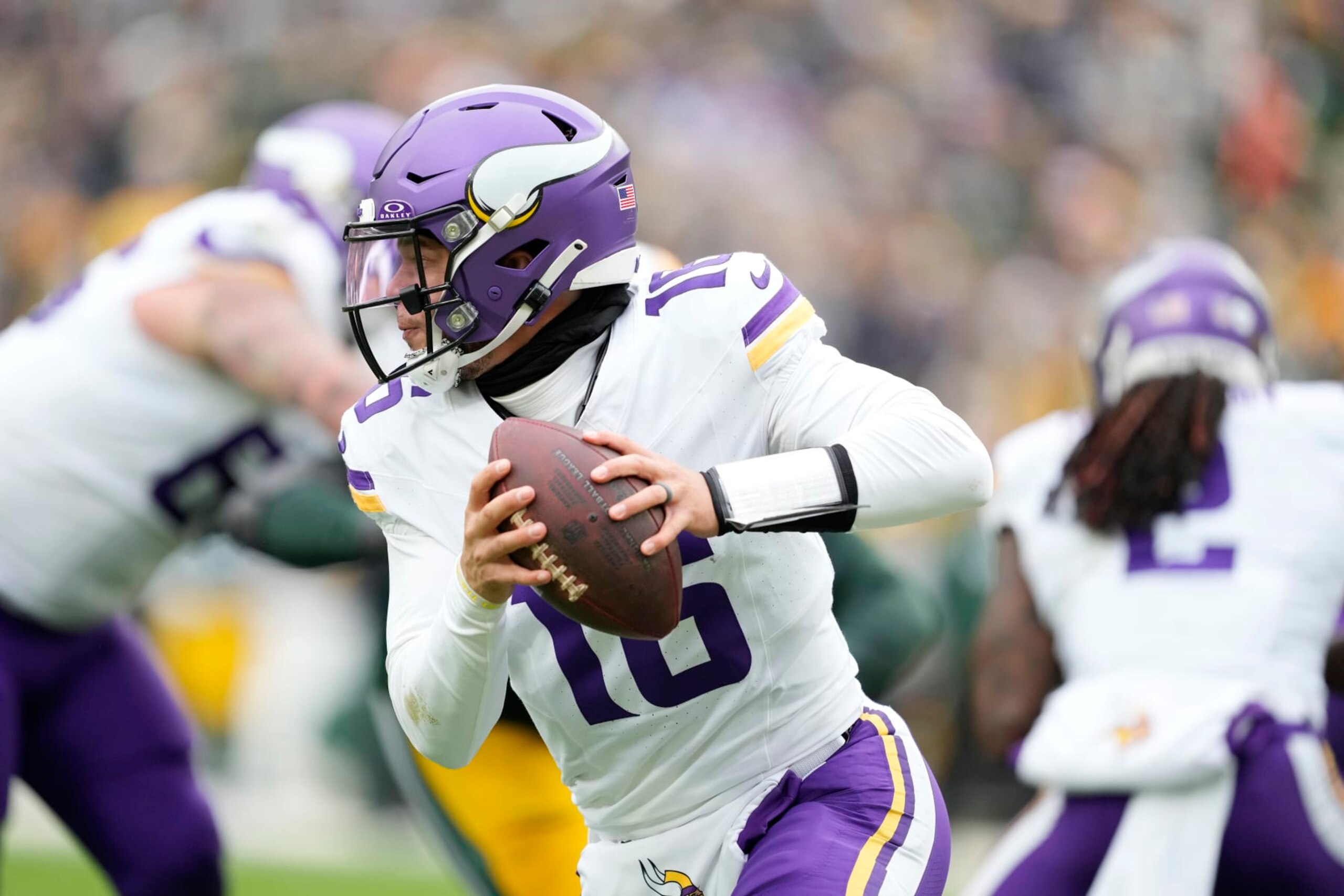 GREEN BAY, WISCONSIN - OCTOBER 29: Jaren Hall #16 of the Minnesota Vikings in action against the Green Bay Packers in the second half at Lambeau Field on October 29, 2023 in Green Bay, Wisconsin. (Photo by Patrick McDermott/Getty Images)