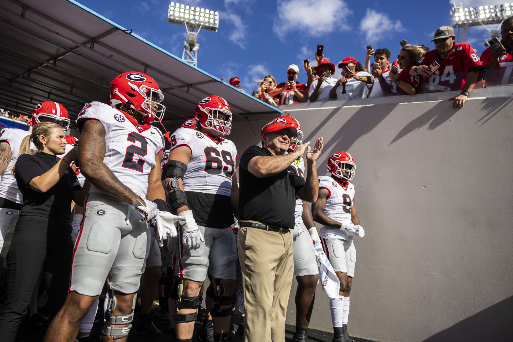 JACKSONVILLE, FLORIDA - OCTOBER 28: Head coach Kirby Smart of the Georgia Bulldogs takes the field with his team before the start of a game against the Florida Gators at EverBank Stadium on October 28, 2023 in Jacksonville, Florida. (Photo by James Gilbert/Getty Images)