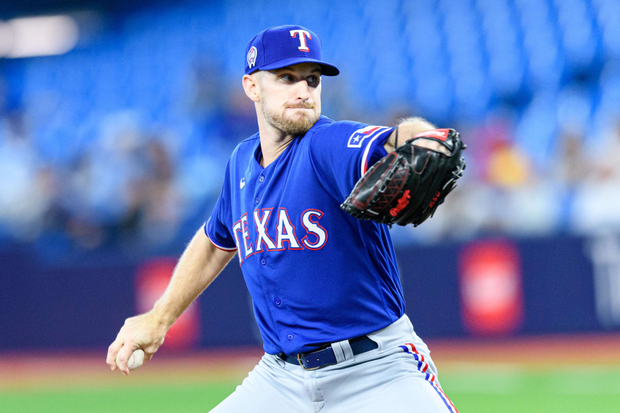 TORONTO, ON - SEPTEMBER 11: Texas Rangers Pitcher Chris Stratton (35) throws a pitch during the MLB baseball regular season game between the Texas Rangers  and the Toronto Blue Jays on September 11, 2023, at Rogers Centre in Toronto, ON, Canada. (Photo by Julian Avram/Icon Sportswire via Getty Images)