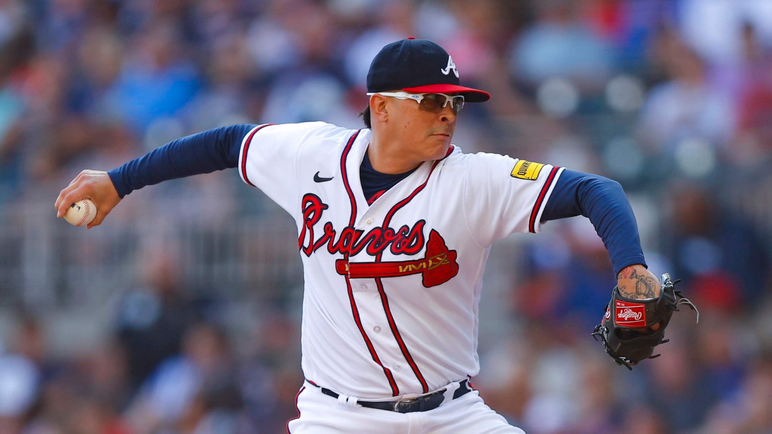 ATLANTA, GEORGIA - OCTOBER 1: Jesse Chavez #60 of the Atlanta Braves pitches during the sixth inning against the Washington Nationals at Truist Park on October 1, 2023 in Atlanta, Georgia. (Photo by Todd Kirkland/Getty Images)
