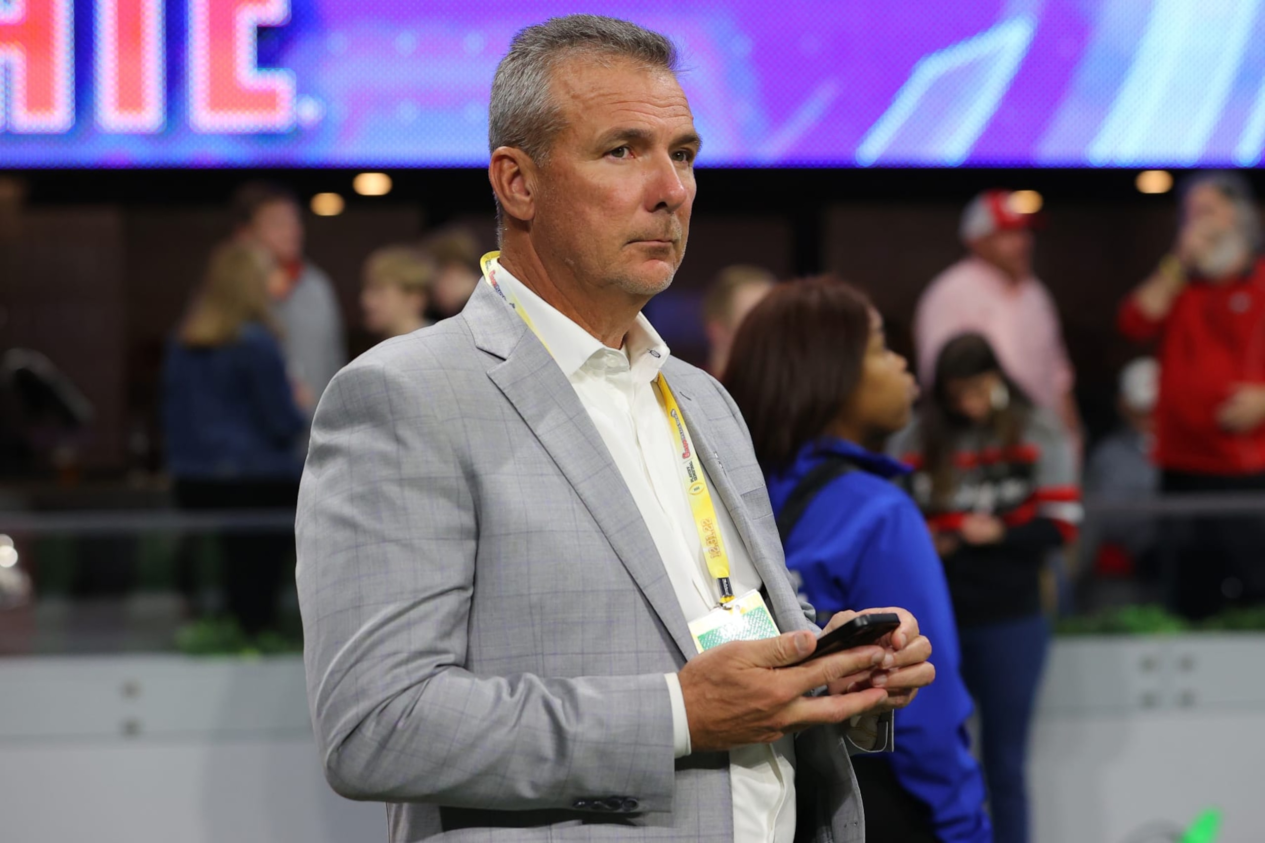 BIRMINGHAM, ALABAMA - MARCH 16: Urban Meyer looks on during the first round game of the NCAA Men's Basketball Tournament between the West Virginia Mountaineers and the Maryland Terrapins at Legacy Arena at the BJCC on March 16, 2023 in Birmingham, Alabama. (Photo by Kevin C. Cox/Getty Images)