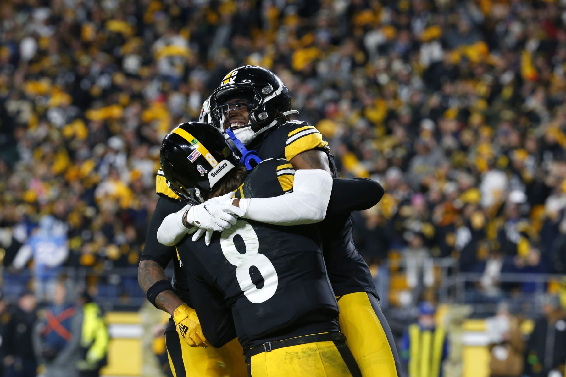 PITTSBURGH, PENNSYLVANIA - NOVEMBER 02: Diontae Johnson #18 of the Pittsburgh Steelers and Kenny Pickett #8 of the Pittsburgh Steelers celebrate a touchdown in the fourth quarter against the Tennessee Titans at Acrisure Stadium on November 02, 2023 in Pittsburgh, Pennsylvania. (Photo by Justin K. Aller/Getty Images)