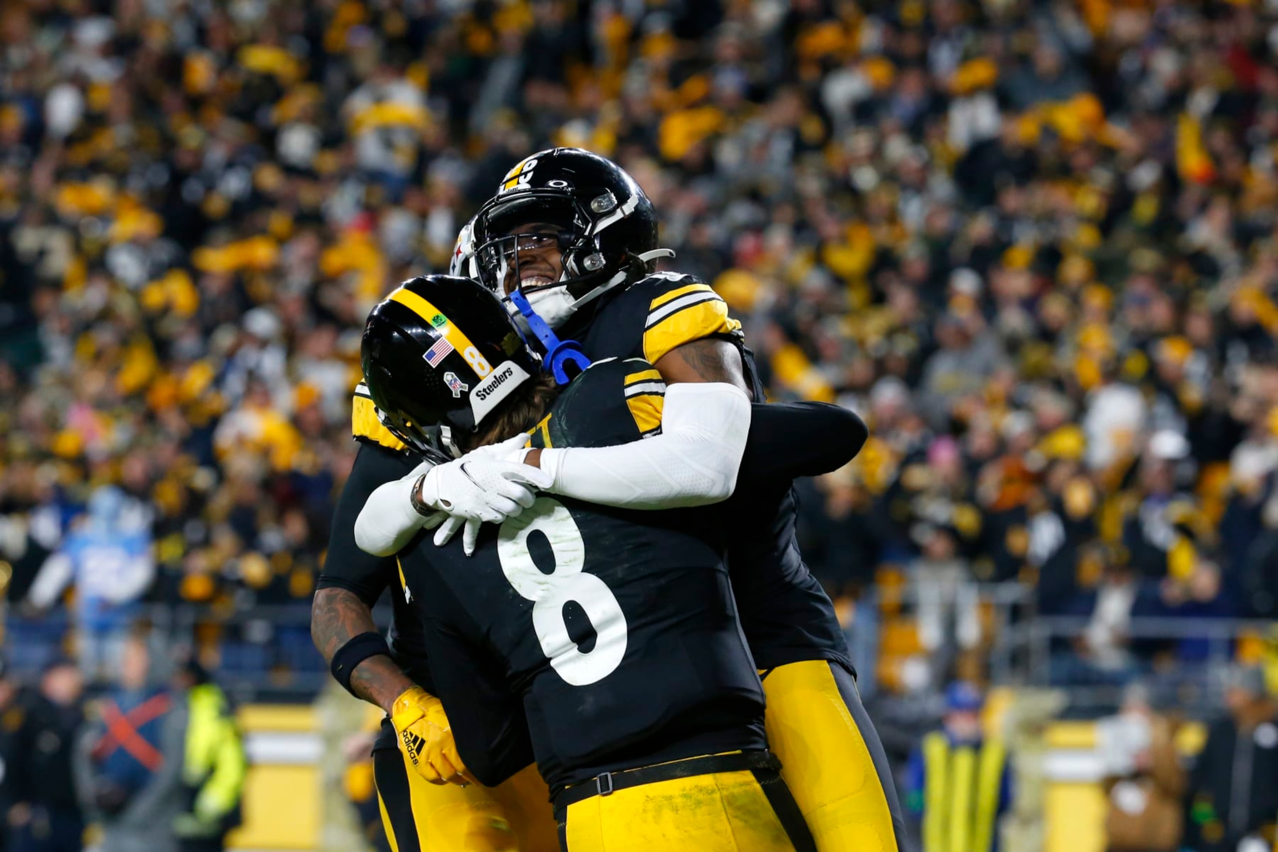 PITTSBURGH, PENNSYLVANIA - NOVEMBER 02: Diontae Johnson #18 of the Pittsburgh Steelers and Kenny Pickett #8 of the Pittsburgh Steelers celebrate a touchdown in the fourth quarter against the Tennessee Titans at Acrisure Stadium on November 02, 2023 in Pittsburgh, Pennsylvania. (Photo by Justin K. Aller/Getty Images)