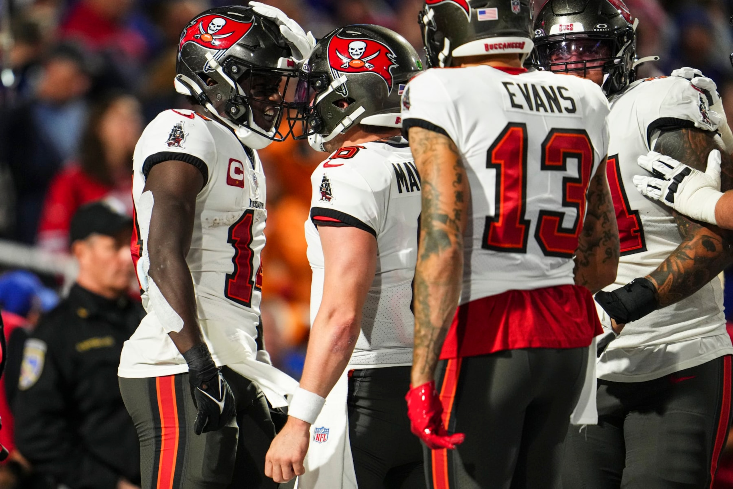 ORCHARD PARK, NY - OCTOBER 26: Chris Godwin #14 of the Tampa Bay Buccaneers celebrates with Baker Mayfield #6 during an NFL football game against the Buffalo Bills at Highmark Stadium on October 26, 2023 in Orchard Park, New York. (Photo by Cooper Neill/Getty Images) ORCHARD PARK, NY - OCTOBER 26: Chris Godwin #14 of the Tampa Bay Buccaneers celebrates with Baker Mayfield #6 during an NFL football game against the Buffalo Bills at Highmark Stadium on October 26, 2023 in Orchard Park, New York. (Photo by Cooper Neill/Getty Images)