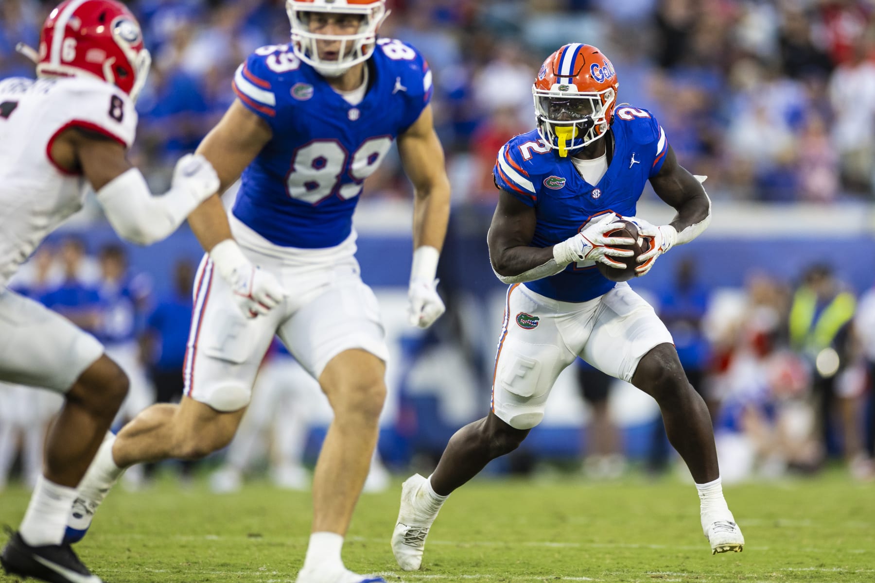 JACKSONVILLE, FLORIDA - OCTOBER 28: Montrell Johnson Jr. #2 of the Florida Gators runs the ball during the second half against the Georgia Bulldogs of a game at EverBank Stadium on October 28, 2023 in Jacksonville, Florida. (Photo by James Gilbert/Getty Images)