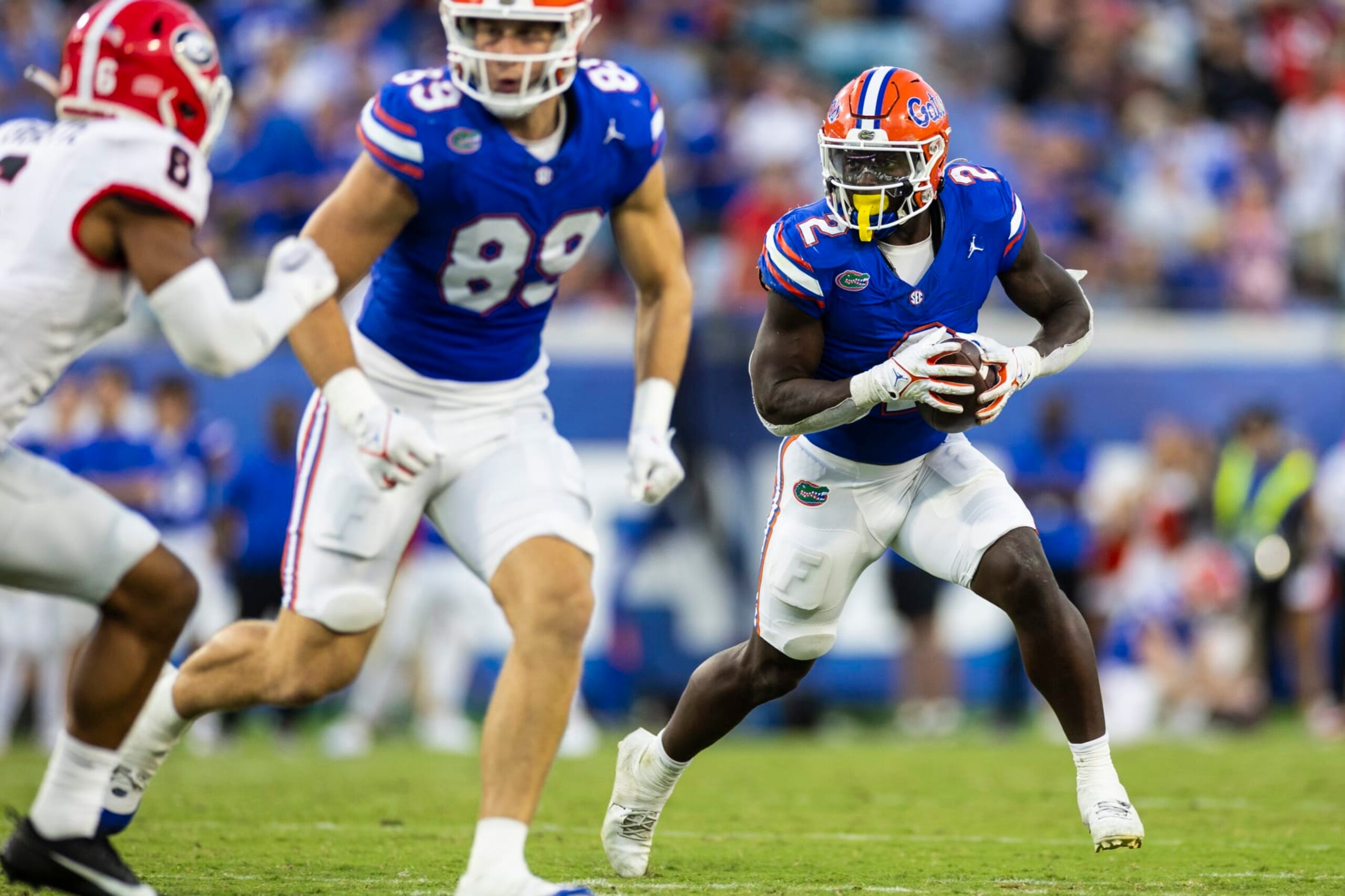 JACKSONVILLE, FLORIDA - OCTOBER 28: Montrell Johnson Jr. #2 of the Florida Gators runs the ball during the second half against the Georgia Bulldogs of a game at EverBank Stadium on October 28, 2023 in Jacksonville, Florida. (Photo by James Gilbert/Getty Images)