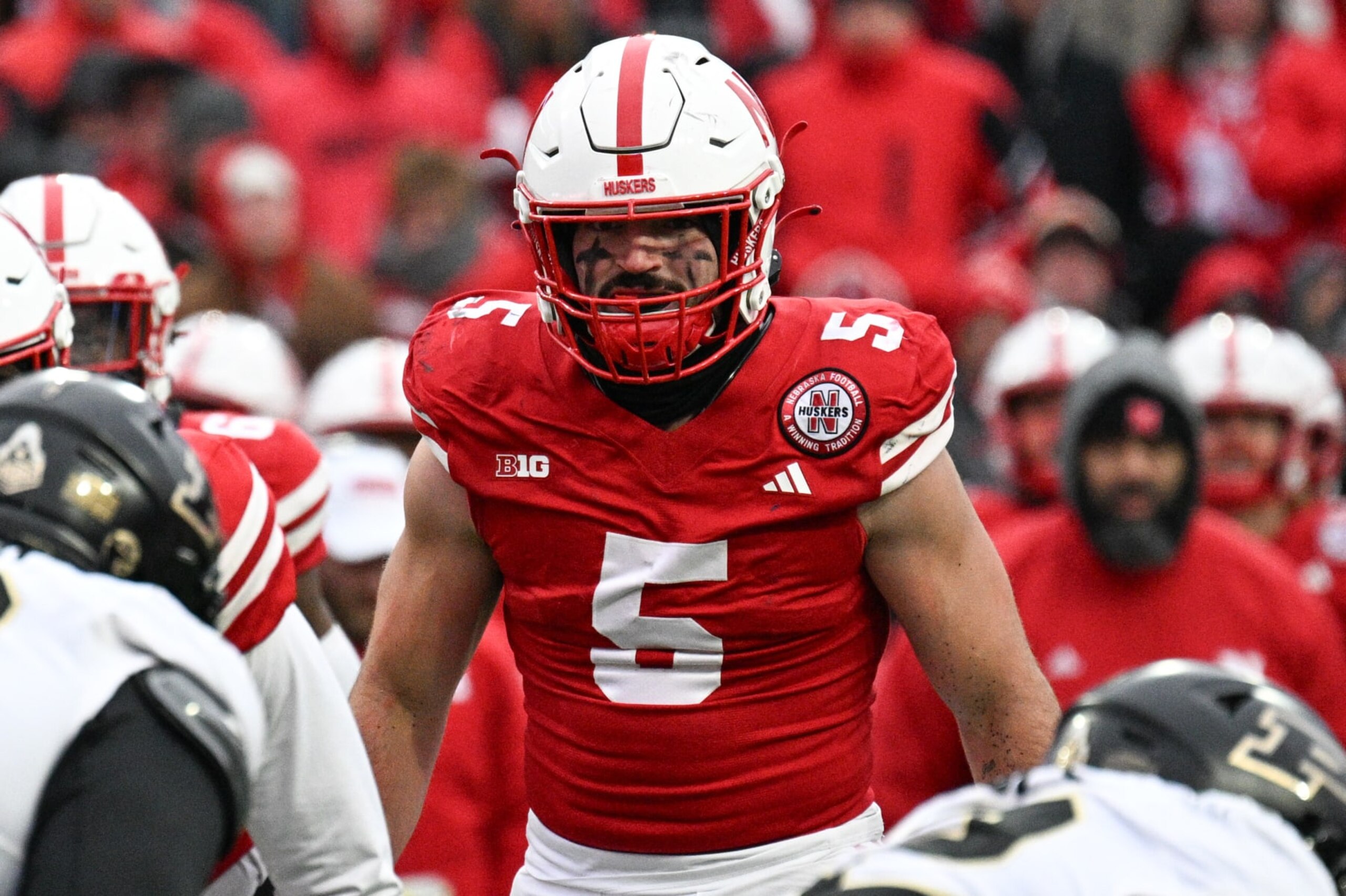 LINCOLN, NEBRASKA - OCTOBER 28: Linebacker John Bullock #5 of the Nebraska Cornhuskers looks over the line against the Purdue Boilermakers in the third quarter at Memorial Stadium on October 28, 2023 in Lincoln, Nebraska. (Photo by Steven Branscombe/Getty Images)