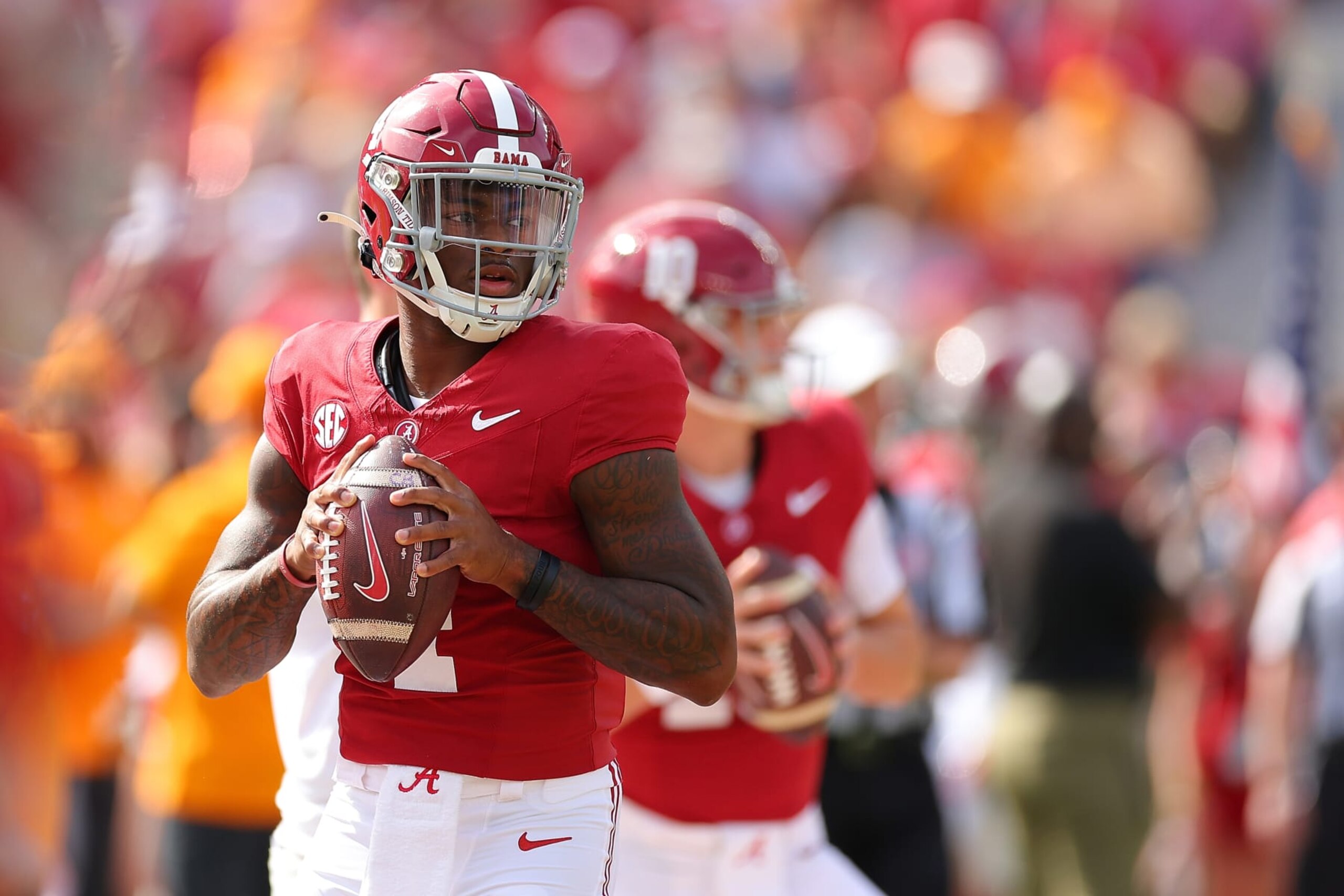 TUSCALOOSA, ALABAMA - OCTOBER 21:   Jalen Milroe #4 of the Alabama Crimson Tide warms up prior to facing the Tennessee Volunteers at Bryant-Denny Stadium on October 21, 2023 in Tuscaloosa, Alabama. (Photo by Kevin C. Cox/Getty Images)