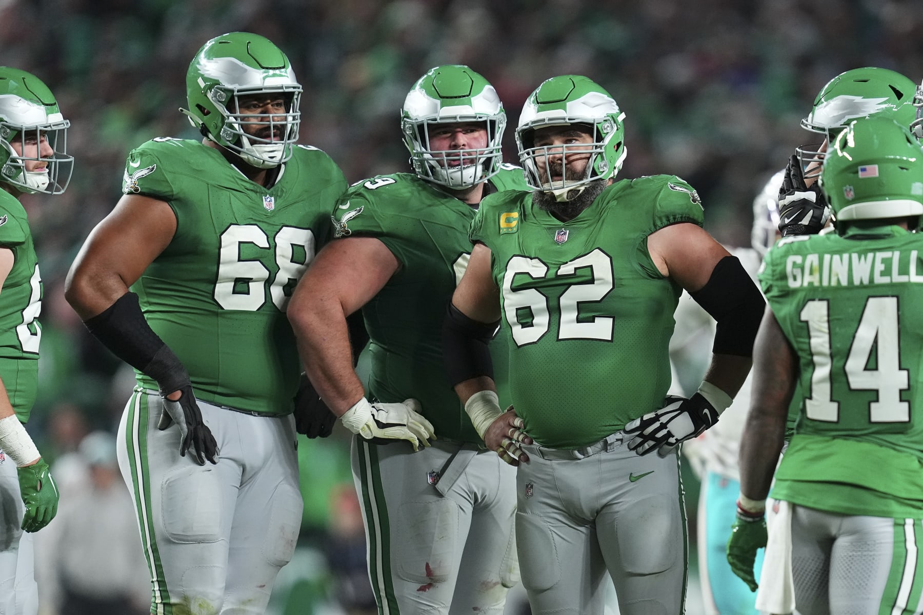 PHILADELPHIA, PENNSYLVANIA - OCTOBER 22: Jordan Mailata #68, Landon Dickerson #69, and Jason Kelce #62 of the Philadelphia Eagles huddle against the Miami Dolphins at Lincoln Financial Field on October 22, 2023 in Philadelphia, Pennsylvania. (Photo by Mitchell Leff/Getty Images)
