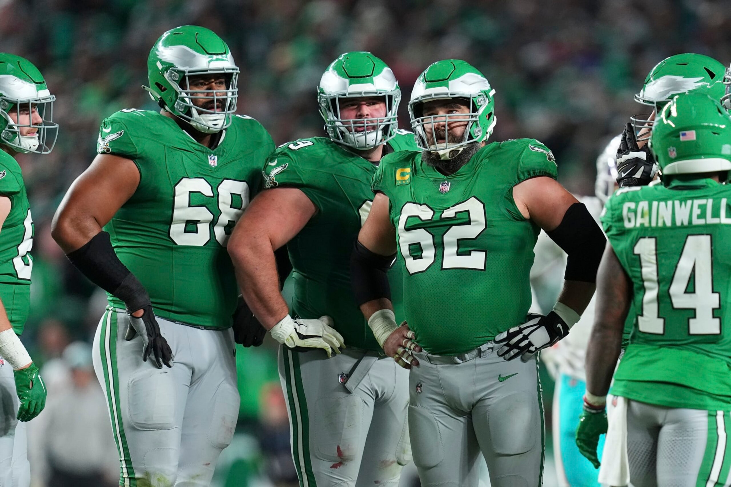 PHILADELPHIA, PENNSYLVANIA - OCTOBER 22: Jordan Mailata #68, Landon Dickerson #69, and Jason Kelce #62 of the Philadelphia Eagles huddle against the Miami Dolphins at Lincoln Financial Field on October 22, 2023 in Philadelphia, Pennsylvania. (Photo by Mitchell Leff/Getty Images) PHILADELPHIA, PENNSYLVANIA - OCTOBER 22: Jordan Mailata #68, Landon Dickerson #69, and Jason Kelce #62 of the Philadelphia Eagles huddle against the Miami Dolphins at Lincoln Financial Field on October 22, 2023 in Philadelphia, Pennsylvania. (Photo by Mitchell Leff/Getty Images)