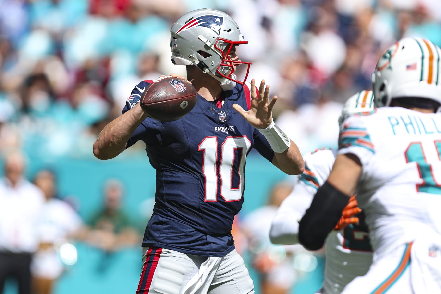 MIAMI GARDENS, FL - OCTOBER 29: Mac Jones #10 of the New England Patriots throws the ball during an NFL football game against the Miami Dolphins at Hard Rock Stadium on October 29, 2023 in Miami Gardens, Florida. (Photo by Perry Knotts/Getty Images)