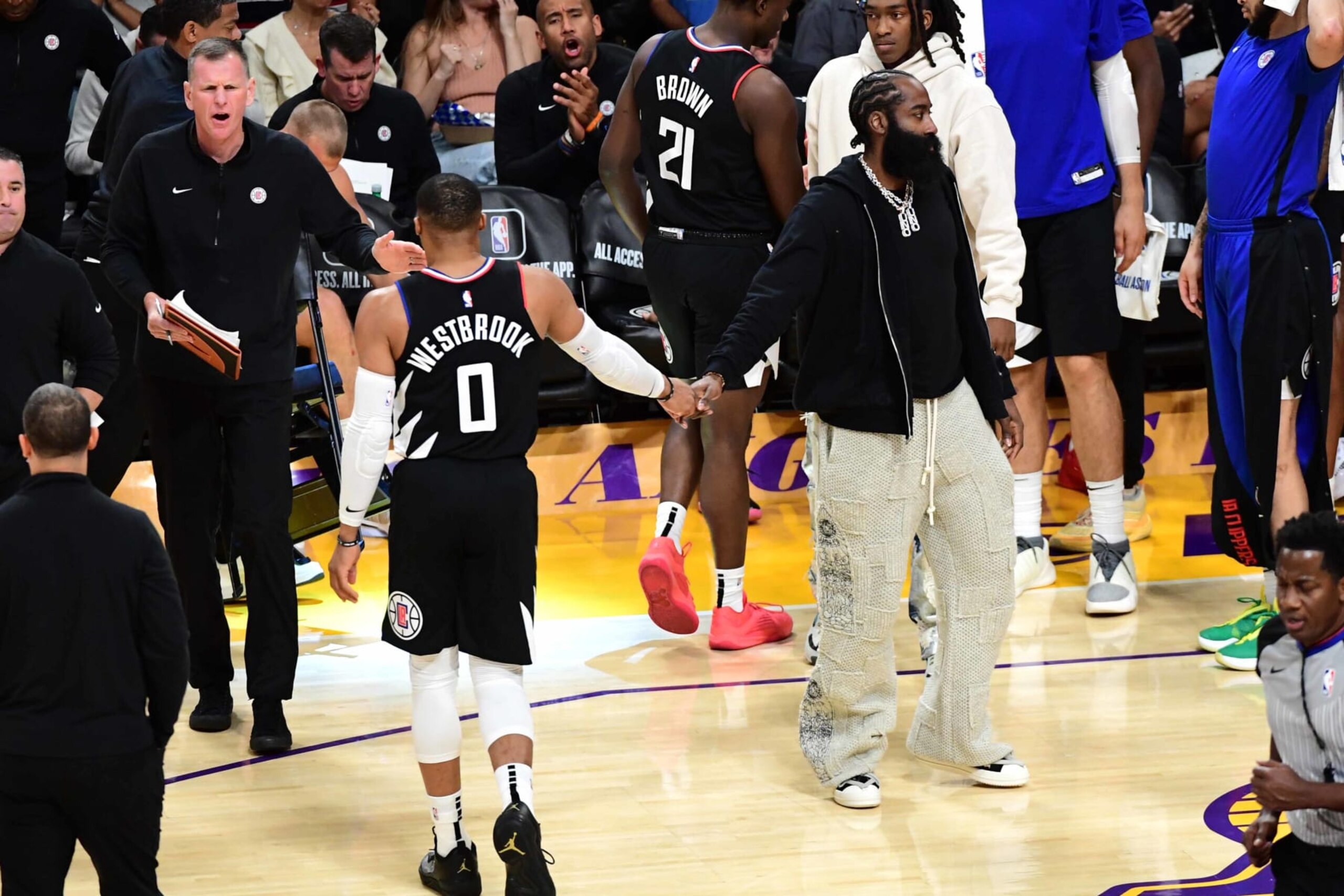 LOS ANGELES, CA - NOVEMBER 1: Russell Westbrook #0 of the LA Clippers high fives James Harden #1 of the LA Clippers during the game against the Los Angeles Lakers on November 1, 2023 at Crypto.Com Arena in Los Angeles, California. NOTE TO USER: User expressly acknowledges and agrees that, by downloading and/or using this Photograph, user is consenting to the terms and conditions of the Getty Images License Agreement. Mandatory Copyright Notice: Copyright 2023 NBAE (Photo by Adam Pantozzi/NBAE via Getty Images)