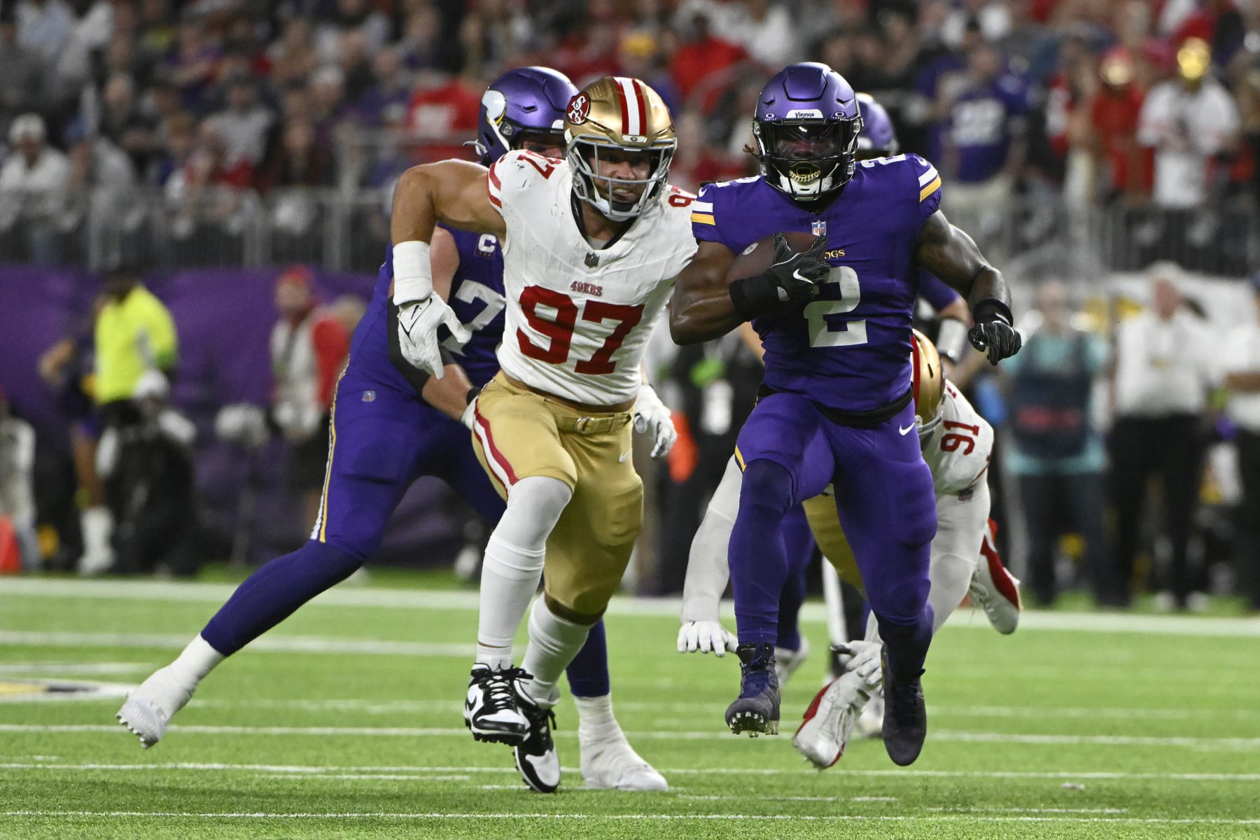 MINNEAPOLIS, MINNESOTA - OCTOBER 23: Alexander Mattison #2 of the Minnesota Vikings during a first half run in front of Nick Bosa #97 of the San Francisco 49ers at U.S. Bank Stadium on October 23, 2023 in Minneapolis, Minnesota. (Photo by Stephen Maturen/Getty Images)