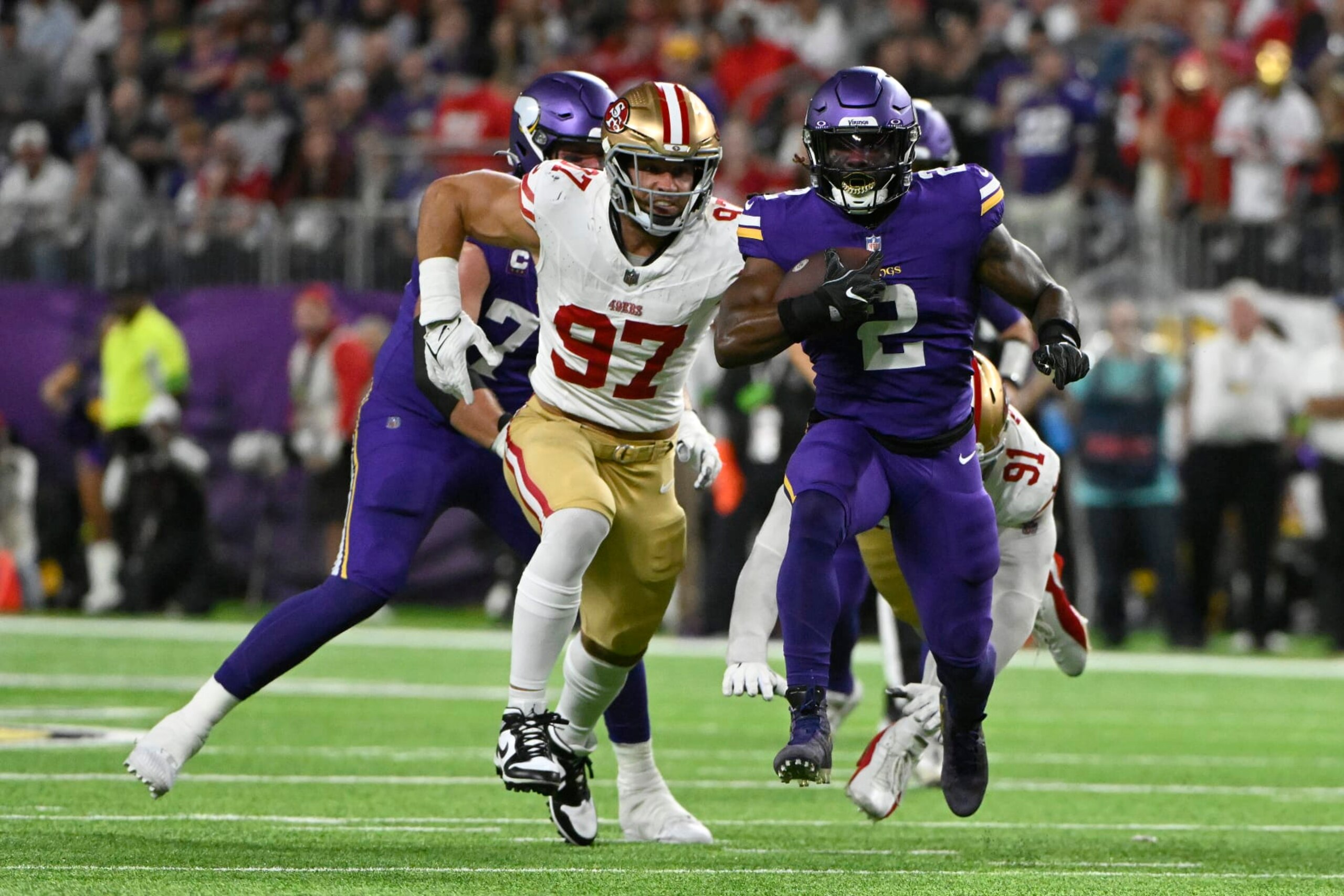 MINNEAPOLIS, MINNESOTA - OCTOBER 23: Alexander Mattison #2 of the Minnesota Vikings during a first half run in front of Nick Bosa #97 of the San Francisco 49ers at U.S. Bank Stadium on October 23, 2023 in Minneapolis, Minnesota. (Photo by Stephen Maturen/Getty Images)