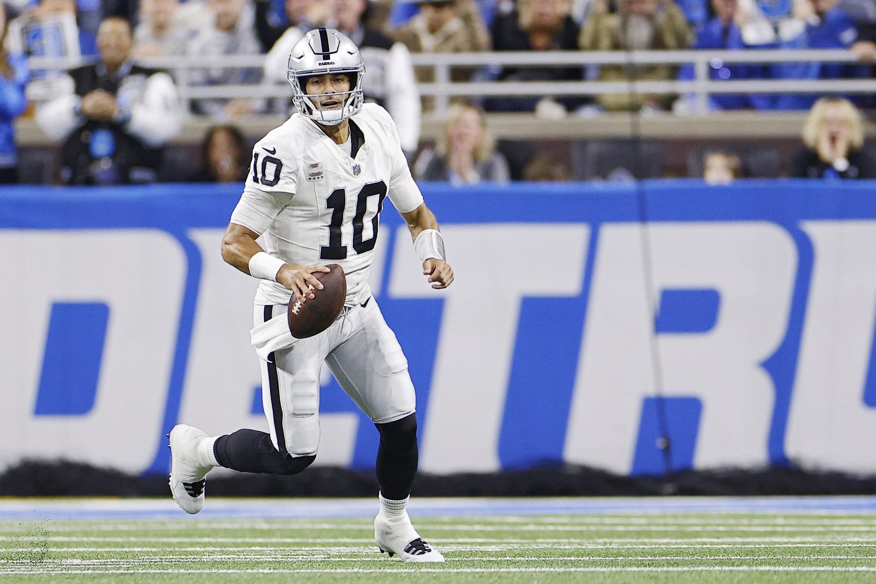 DETROIT, MICHIGAN - OCTOBER 30: Jimmy Garoppolo #10 of the Las Vegas Raiders looks to throw a pass in the first half of a game against the Detroit Lions at Ford Field on October 30, 2023 in Detroit, Michigan. (Photo by Mike Mulholland/Getty Images)