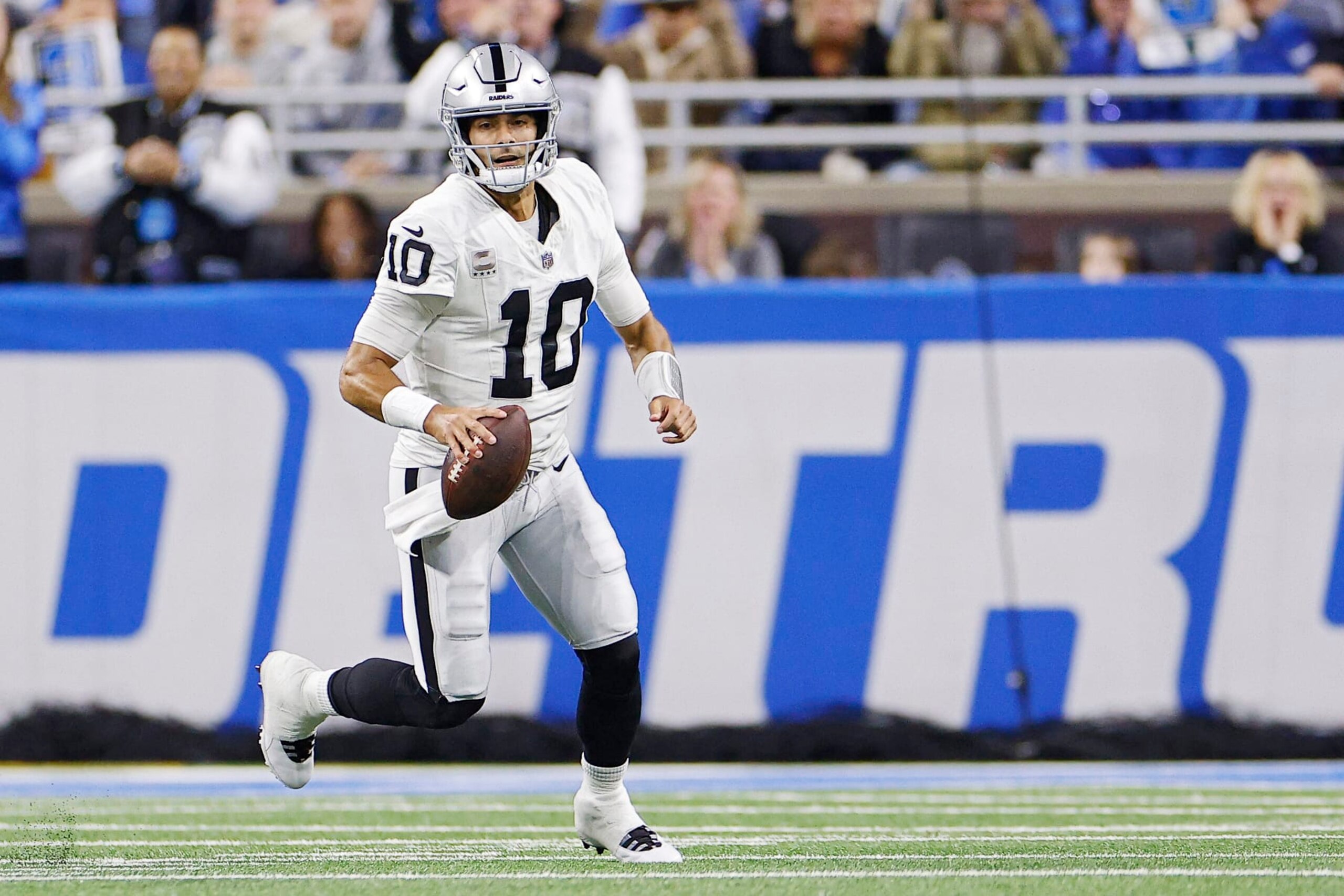 DETROIT, MICHIGAN - OCTOBER 30: Jimmy Garoppolo #10 of the Las Vegas Raiders looks to throw a pass in the first half of a game against the Detroit Lions at Ford Field on October 30, 2023 in Detroit, Michigan. (Photo by Mike Mulholland/Getty Images)