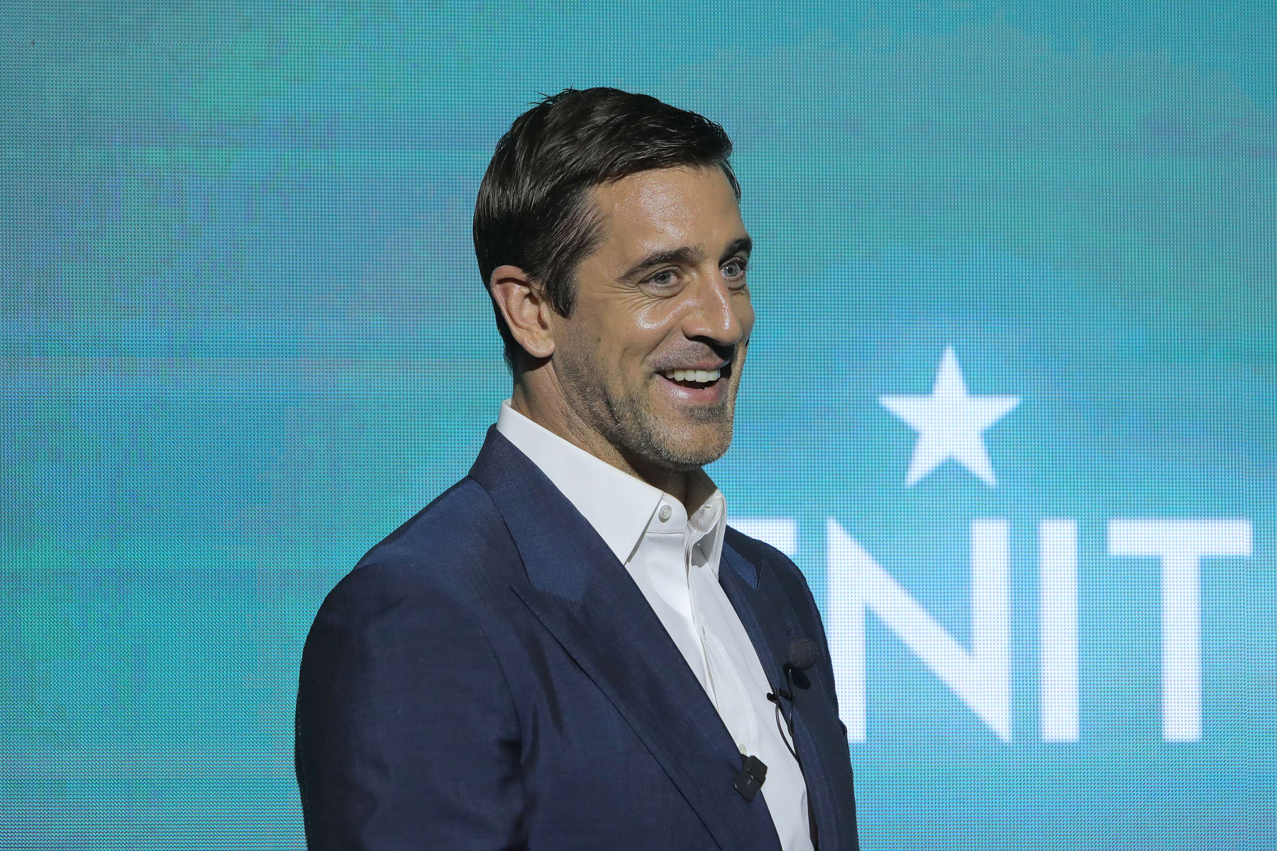 NEW YORK, NEW YORK - OCTOBER 30:  New York Jets Quarterback Aaron Rodgers is on stage as Aaron Rodgers & Zenith unveil his limited edition design on October 30, 2023 in New York City. (Photo by Randy Brooke/FilmMagic)