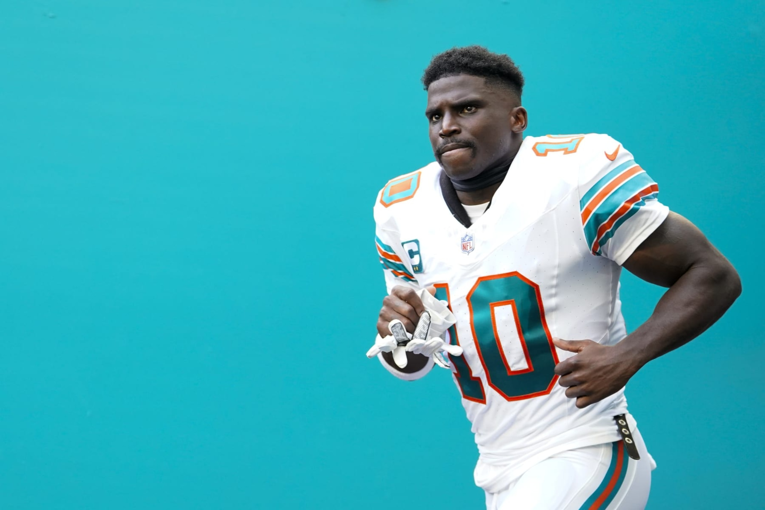 MIAMI GARDENS, FLORIDA - OCTOBER 29: Tyreek Hill #10 of the Miami Dolphins enters the field prior to a game against the New England Patriots at Hard Rock Stadium on October 29, 2023 in Miami Gardens, Florida. (Photo by Rich Storry/Getty Images)