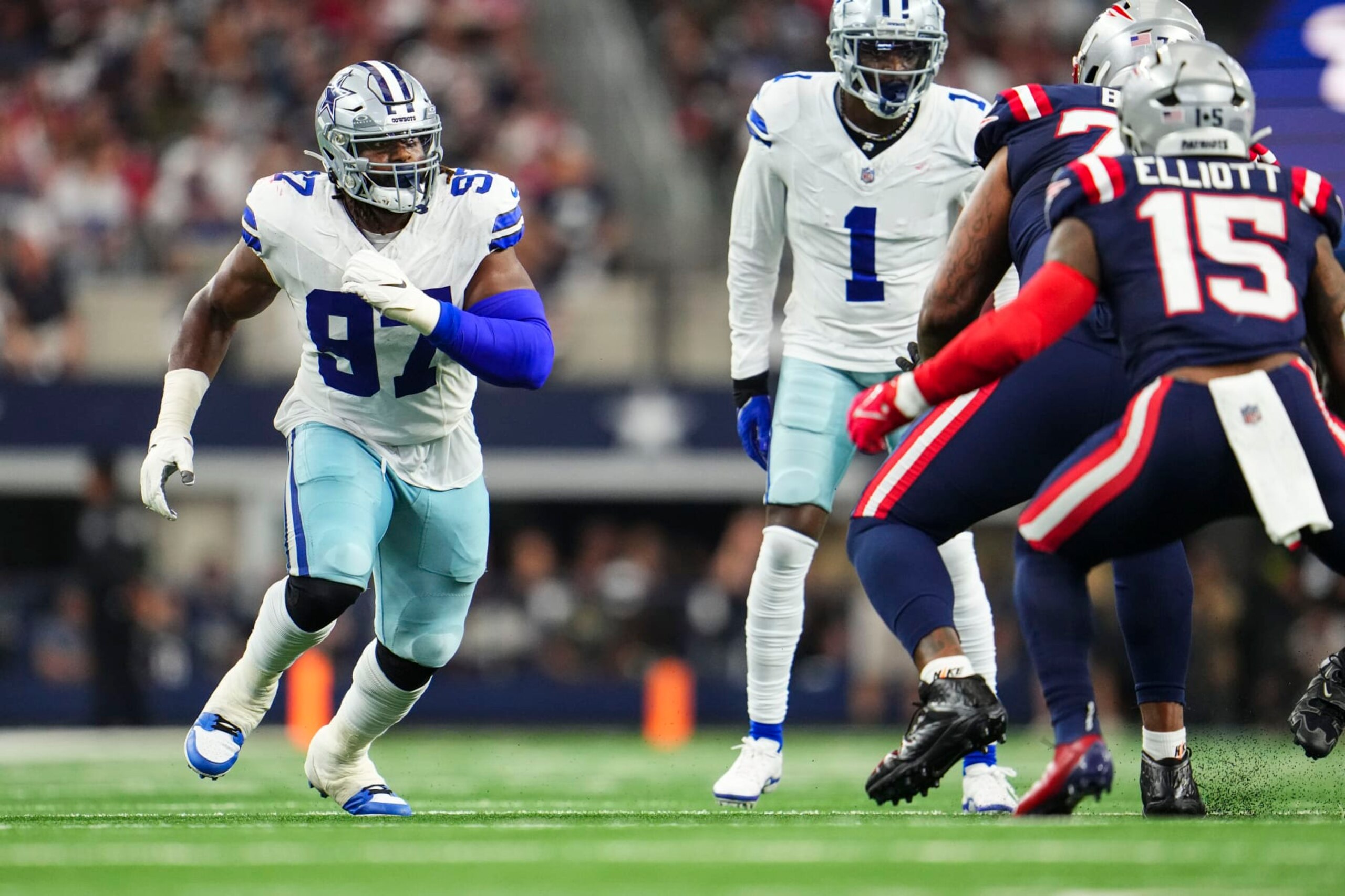ARLINGTON, TX - OCTOBER 01: Osa Odighizuwa #97 of the Dallas Cowboys rushes the passer at AT&T Stadium on October 1, 2023 in Arlington, Texas. (Photo by Cooper Neill/Getty Images)