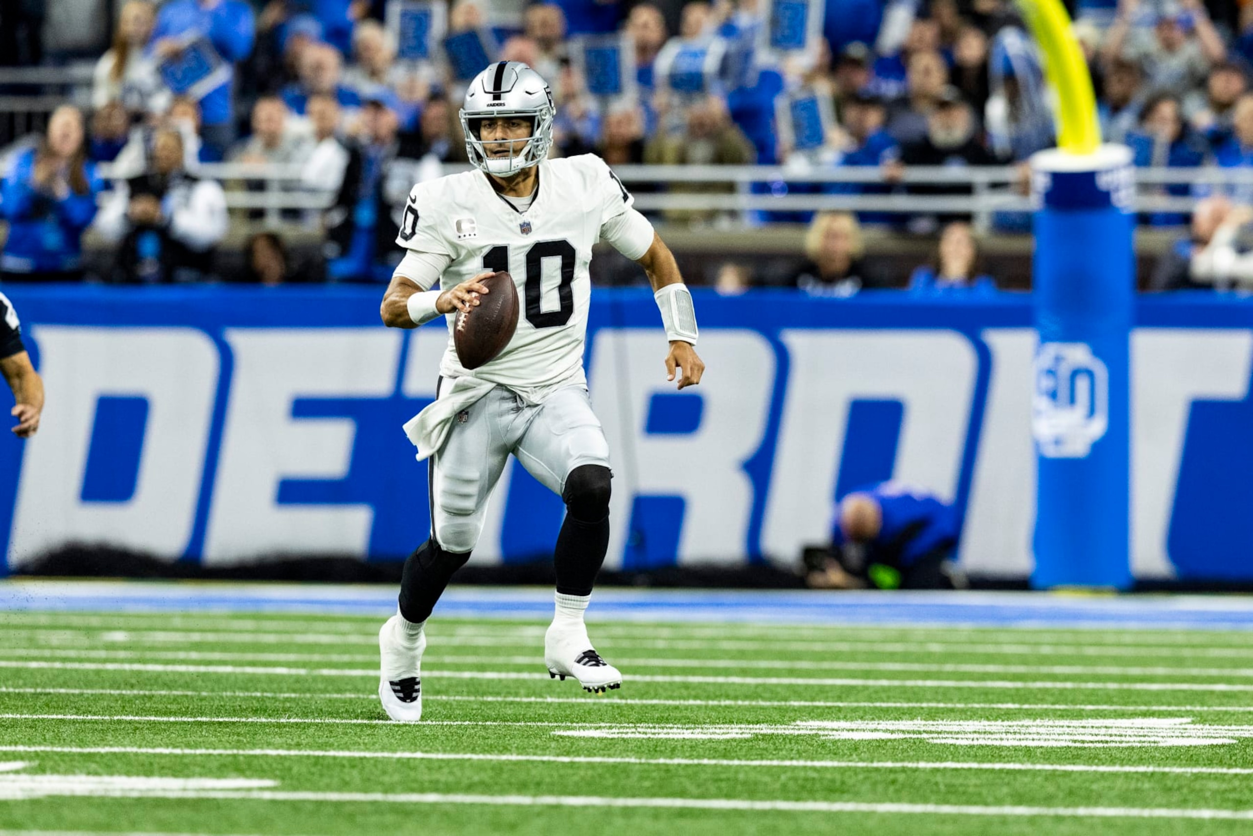 DETROIT, MICHIGAN - OCTOBER 30: Jimmy Garoppolo #10 of the Las Vegas Raiders runs the ball during the game against the Detroit Lions at Ford Field on October 30, 2023 in Detroit, Michigan. The Lions beat the Raiders 26-14. (Photo by Lauren Leigh Bacho/Getty Images)
