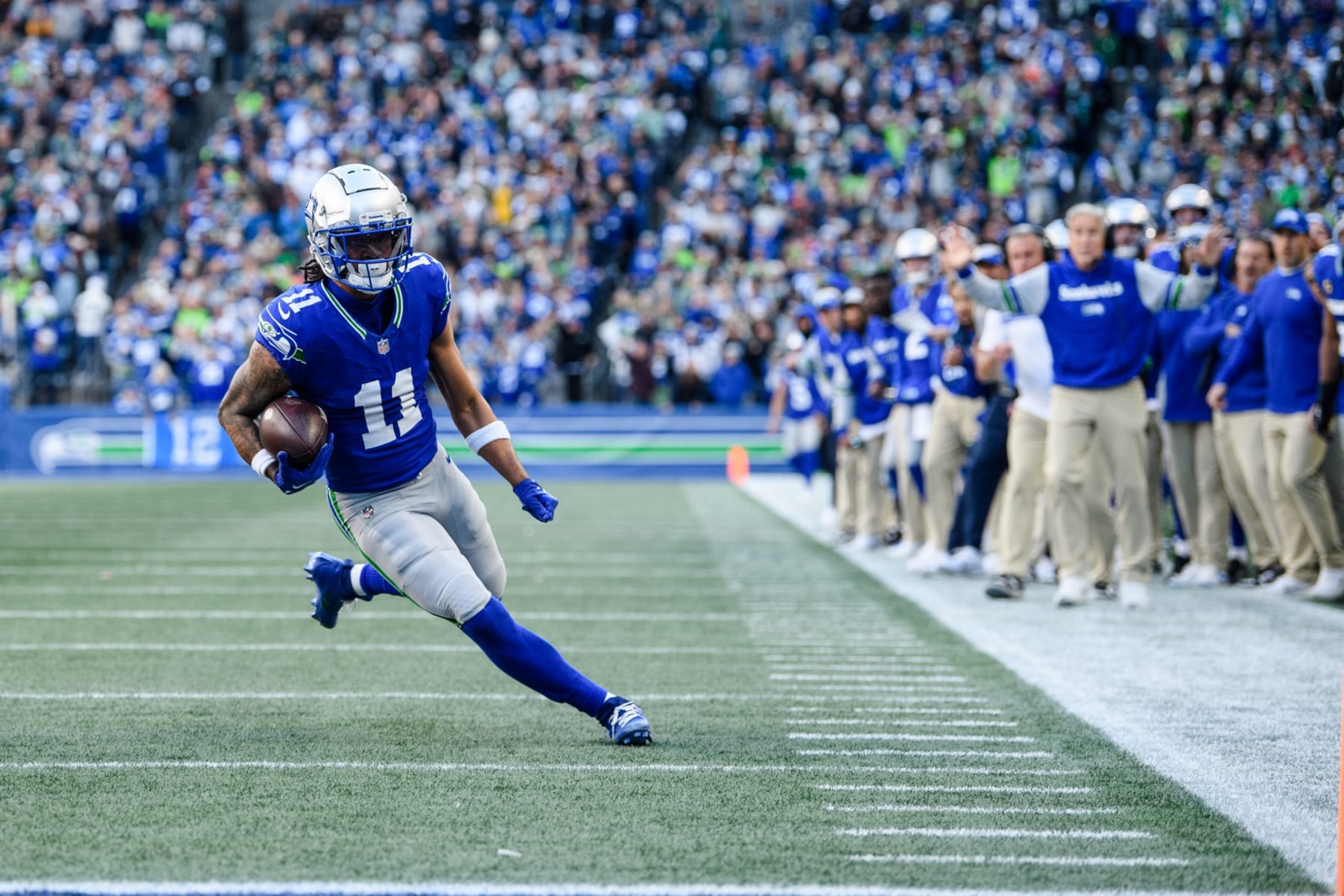SEATTLE, WASHINGTON - OCTOBER 29: Jaxon Smith-Njigba #11 of the Seattle Seahawks carries the ball during the fourth quarter of the game against the Cleveland Browns at Lumen Field on October 29, 2023 in Seattle, Washington. (Photo by Jane Gershovich/Getty Images)