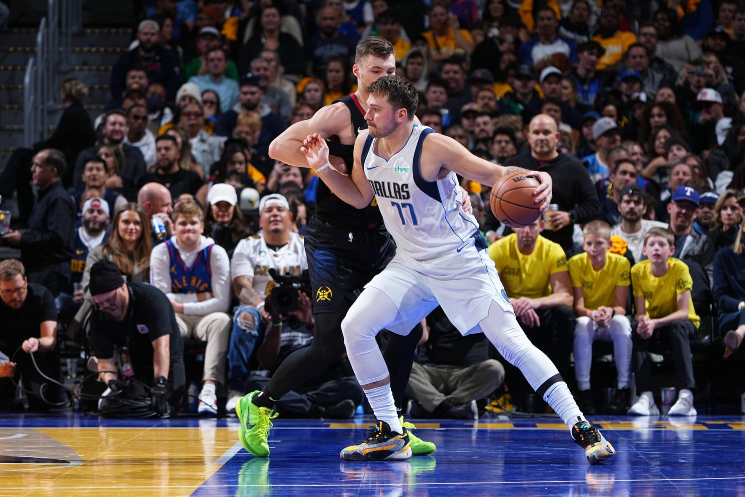 DENVER, CO - NOVEMBER 3: Luka Doncic #77 of the Dallas Mavericks dribbles the ball during the game against the Denver Nuggets during the In-Season Tournament on November 3, 2023 at the Ball Arena in Denver, Colorado. NOTE TO USER: User expressly acknowledges and agrees that, by downloading and/or using this Photograph, user is consenting to the terms and conditions of the Getty Images License Agreement. Mandatory Copyright Notice: Copyright 2023 NBAE (Photo by Garrett Ellwood/NBAE via Getty Images) DENVER, CO - NOVEMBER 3: Luka Doncic #77 of the Dallas Mavericks dribbles the ball during the game against the Denver Nuggets during the In-Season Tournament on November 3, 2023 at the Ball Arena in Denver, Colorado. NOTE TO USER: User expressly acknowledges and agrees that, by downloading and/or using this Photograph, user is consenting to the terms and conditions of the Getty Images License Agreement. Mandatory Copyright Notice: Copyright 2023 NBAE (Photo by Garrett Ellwood/NBAE via Getty Images)