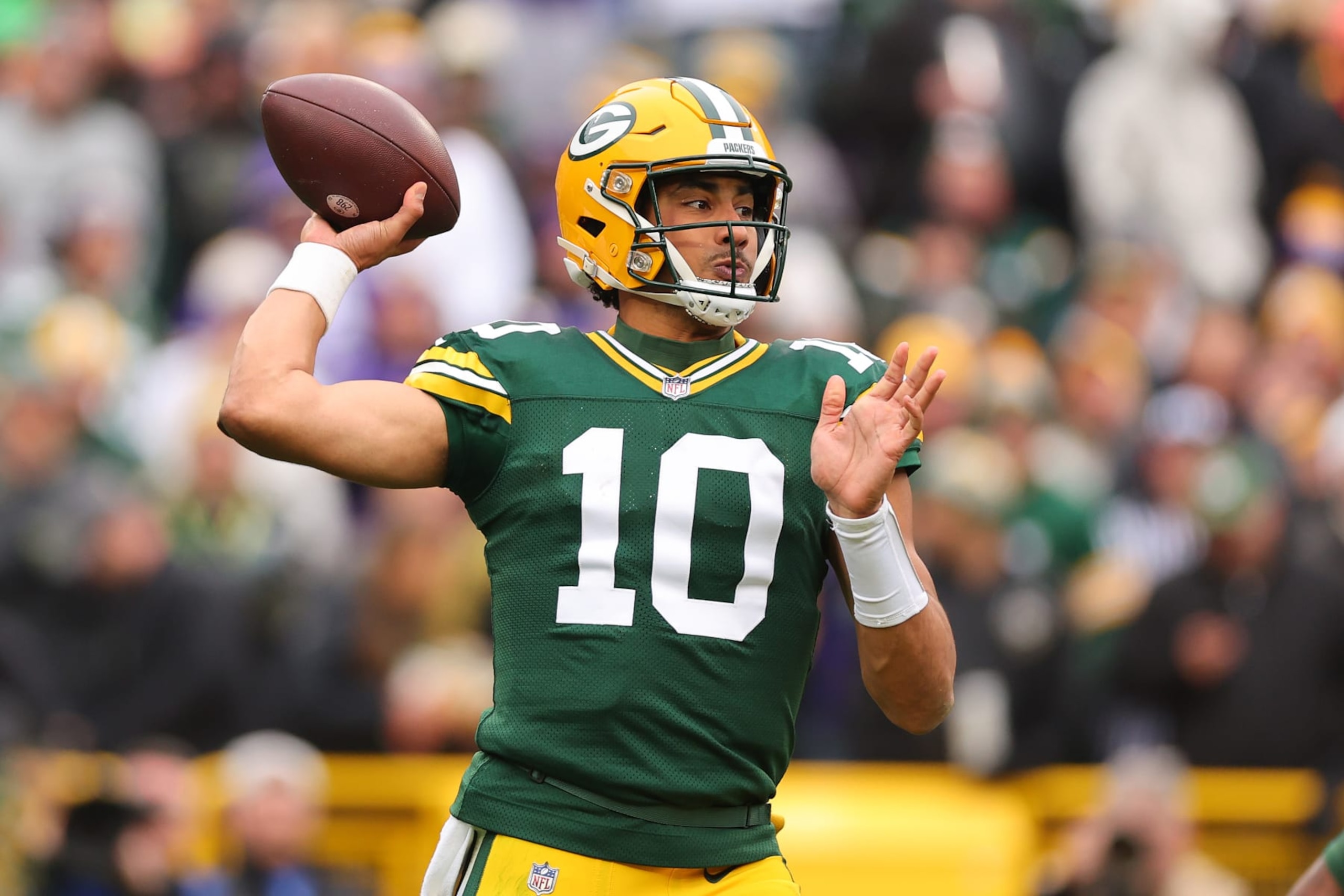 GREEN BAY, WISCONSIN - OCTOBER 29: Jordan Love #10 of the Green Bay Packers throws a pass against the Minnesota Vikings at Lambeau Field on October 29, 2023 in Green Bay, Wisconsin. (Photo by Michael Reaves/Getty Images)