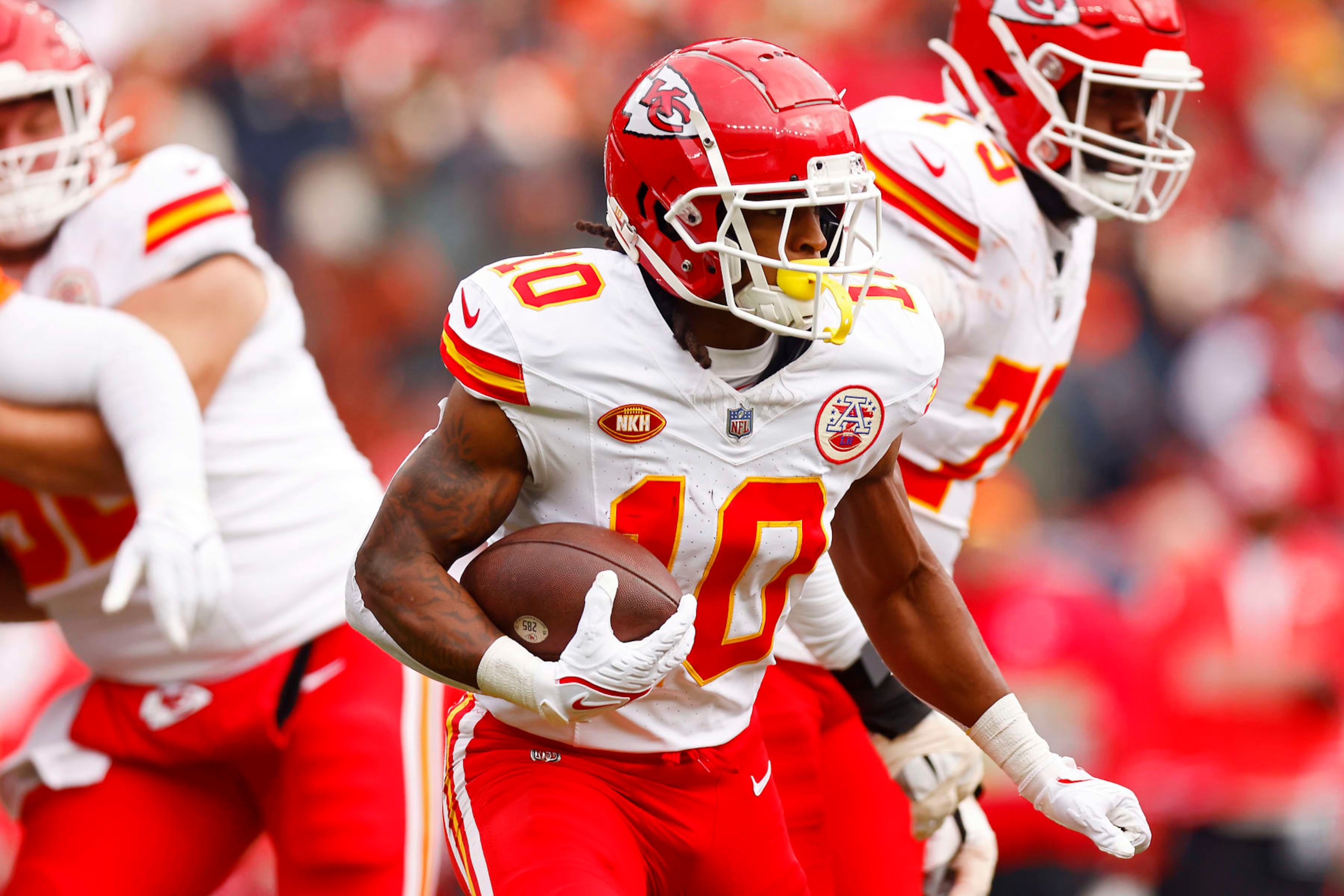 DENVER, COLORADO - OCTOBER 29: Isiah Pacheco #10 of the Kansas City Chiefs runs the ball during the first quarter against the Denver Broncos at Empower Field At Mile High on October 29, 2023 in Denver, Colorado. (Photo by Justin Edmonds/Getty Images)