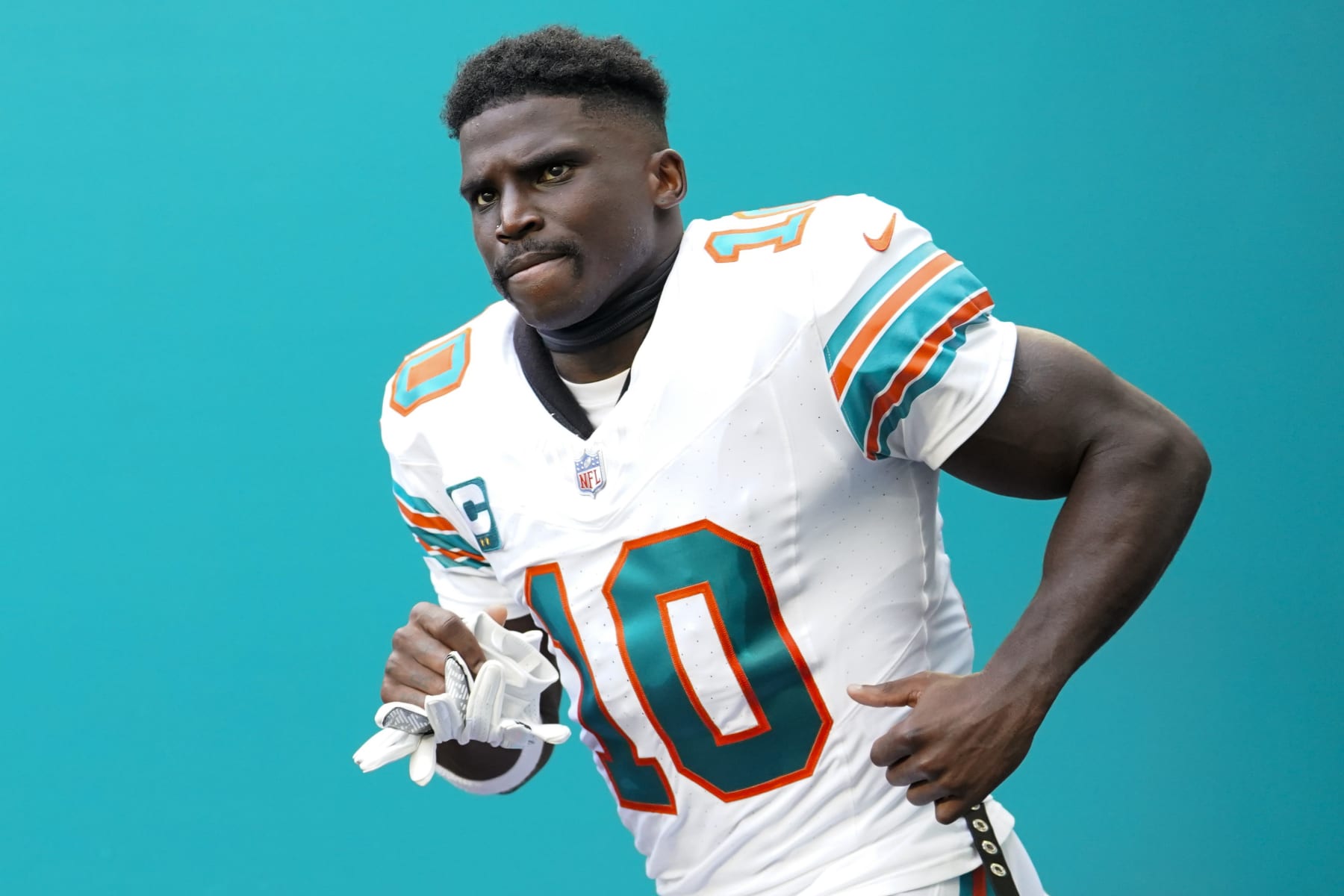 MIAMI GARDENS, FLORIDA - OCTOBER 29: Tyreek Hill #10 of the Miami Dolphins enters the field prior to a game against the New England Patriots at Hard Rock Stadium on October 29, 2023 in Miami Gardens, Florida. (Photo by Rich Storry/Getty Images)