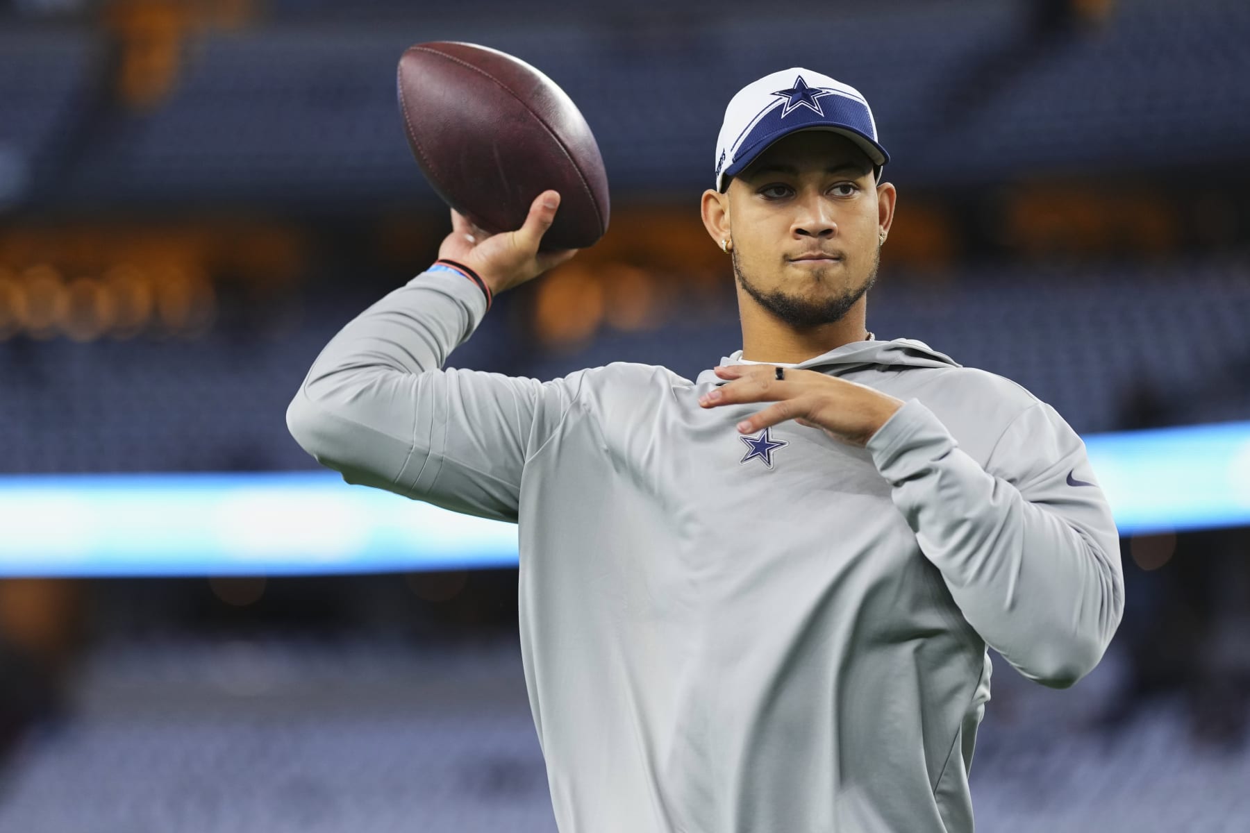 ARLINGTON, TX - OCTOBER 29: Trey Lance #15 of the Dallas Cowboys warms up before kickoff against the Los Angeles Rams at AT&T Stadium on October 29, 2023 in Arlington, Texas. (Photo by Cooper Neill/Getty Images)