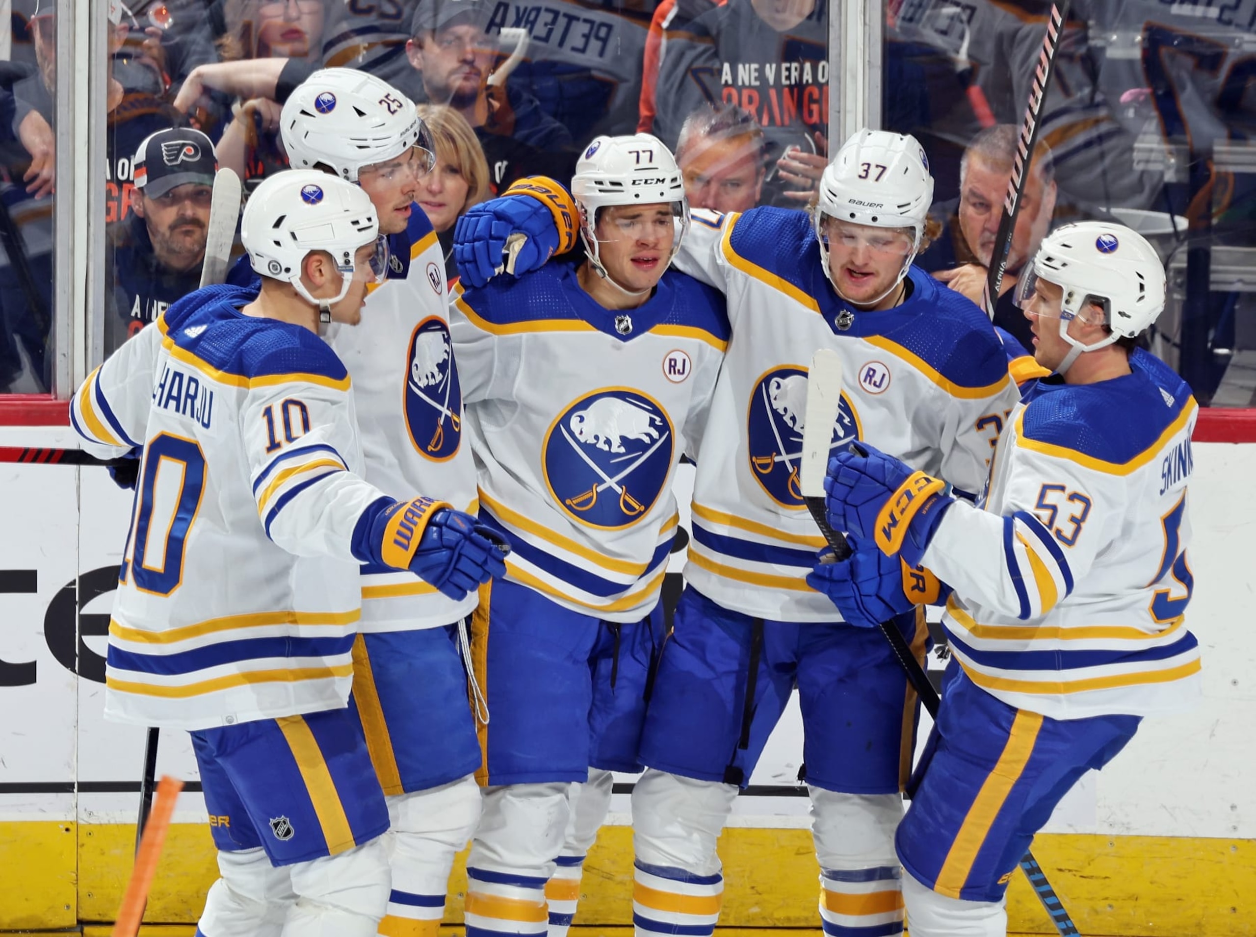 PHILADELPHIA, PENNSYLVANIA - NOVEMBER 01: Casey Mittelstadt #37 of the Buffalo Sabres celebrates his first period goal against the Philadelphia Flyers with teammates Henri Jokiharju #10, Owen Power #25, JJ Peterka #77, and Jeff Skinner #53 at the Wells Fargo Center on November 1, 2023 in Philadelphia, Pennsylvania.  (Photo by Len Redkoles/NHLI via Getty Images)