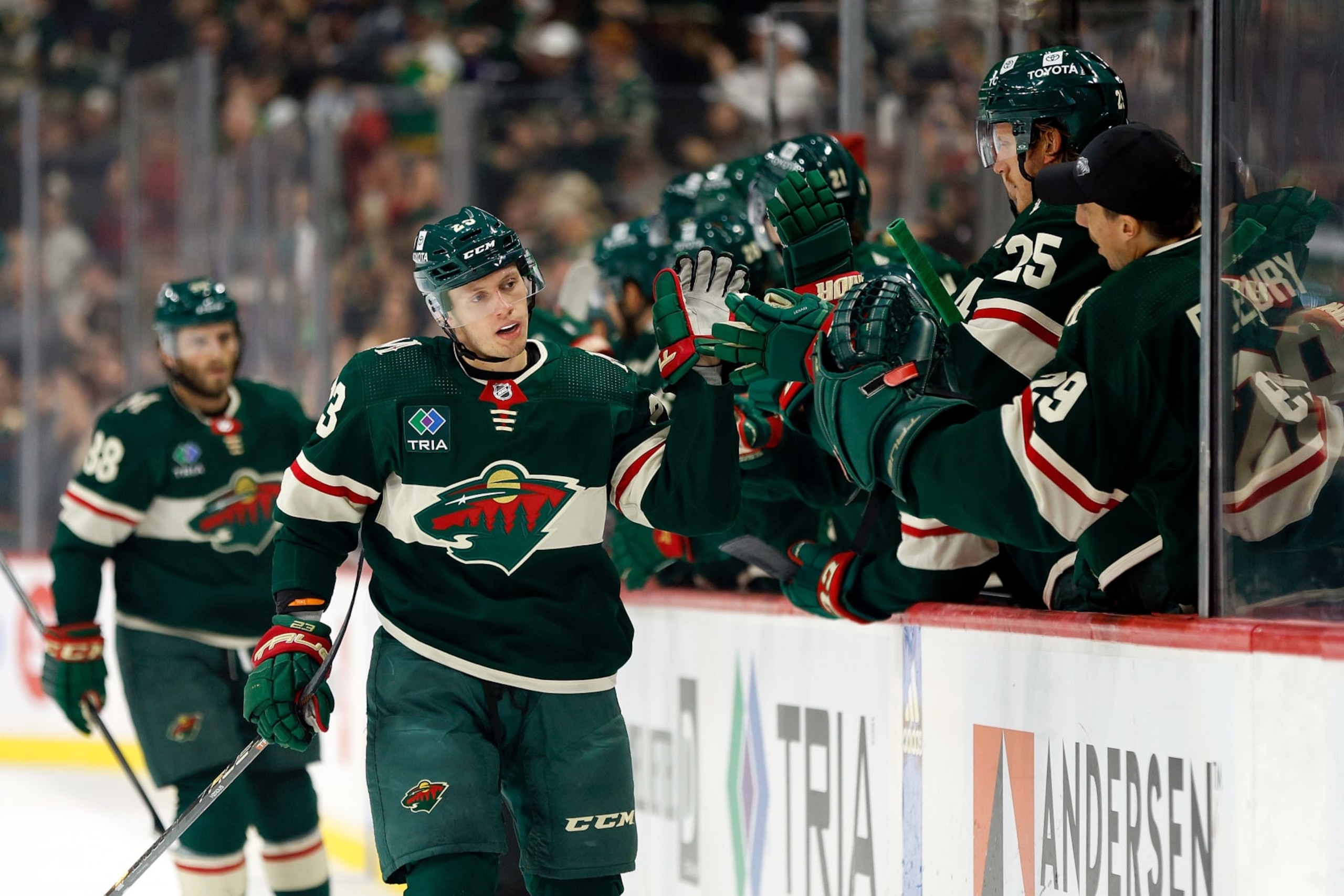 ST PAUL, MINNESOTA - OCTOBER 24: Marco Rossi #23 of the Minnesota Wild celebrates with teammates after scoring in the first period against the Edmonton Oilers at Xcel Energy Center on October 24, 2023 in St Paul, Minnesota. (Photo by David Berding/Getty Images)