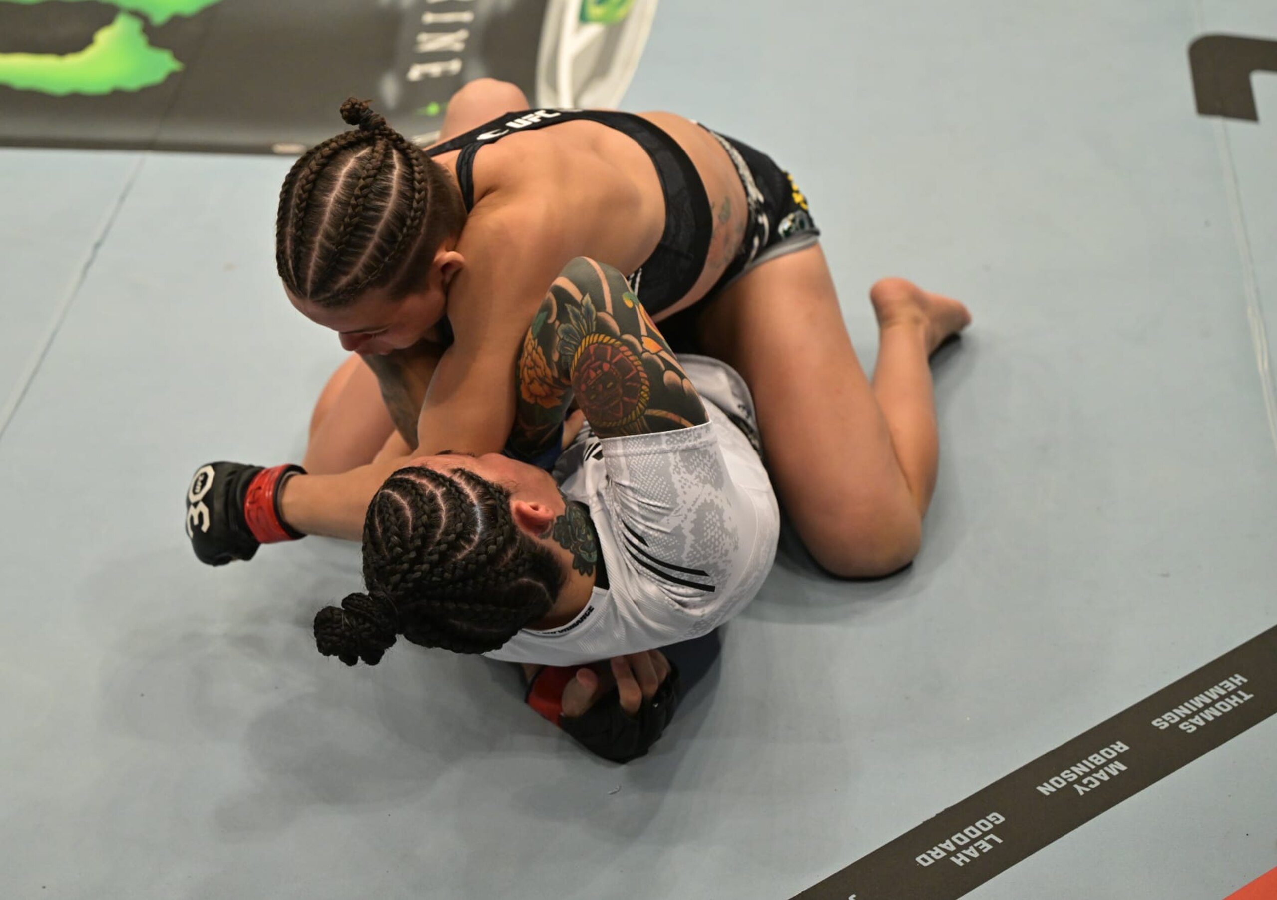 SAO PAULO, BRAZIL - NOVEMBER 04: (R-L) Eduarda Moura of Brazil elbows Montserrat Conejo Ruiz of Mexico in a strawweight fight during the UFC Fight Night event at Ibirapuera Gymnasium on November 04, 2023 in Sao Paulo, Brazil. (Photo by Pedro Vilela/Zuffa LLC via Getty Images)