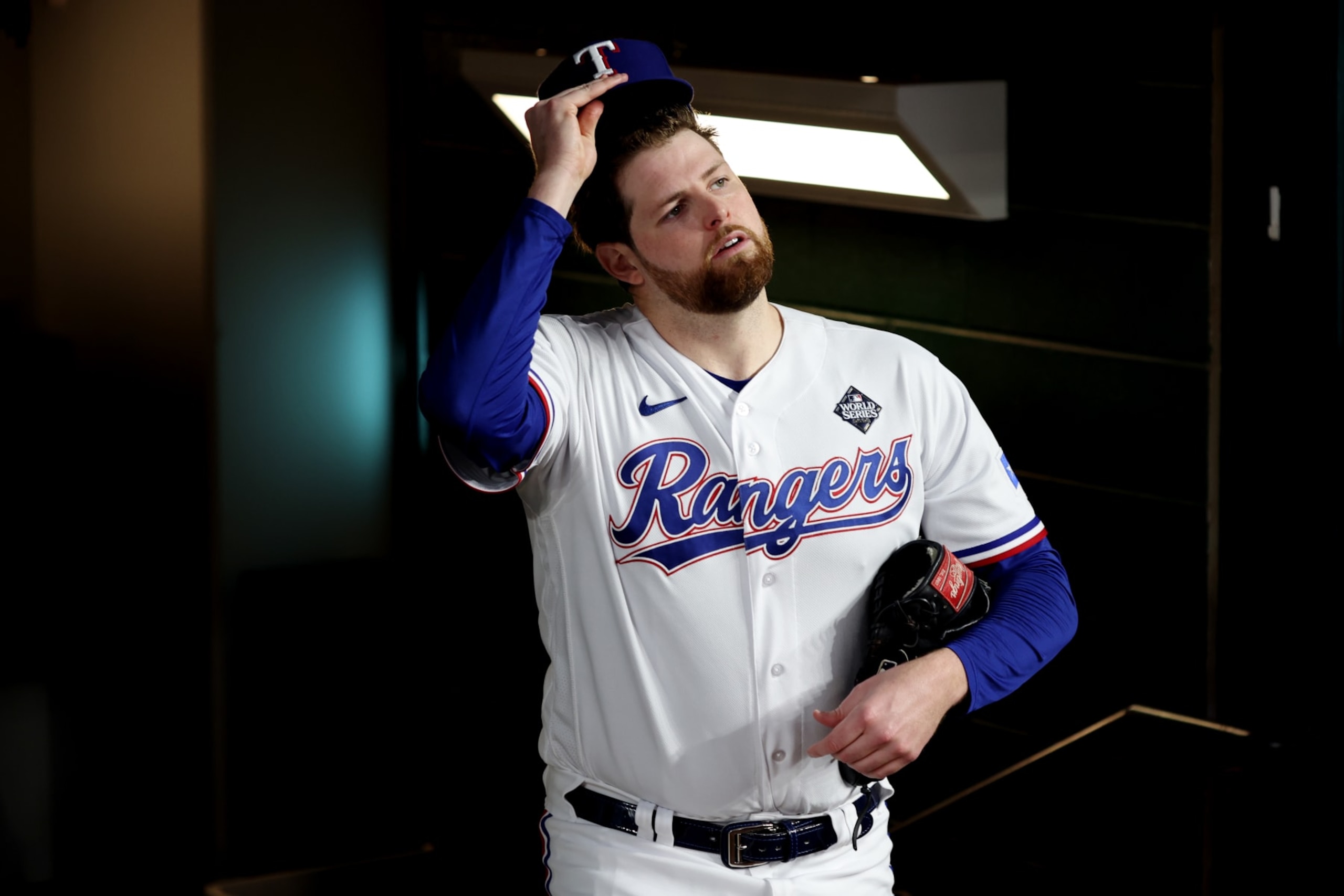 ARLINGTON, TX - OCTOBER 28:  Jordan Montgomery #52 of the Texas Rangers walks into the dugout from the clubhouse prior to Game 2 of the 2023 World Series between the Arizona Diamondbacks and the Texas Rangers at Globe Life Field on Saturday, October 28, 2023 in Arlington, Texas. (Photo by Rob Tringali/MLB Photos via Getty Images)