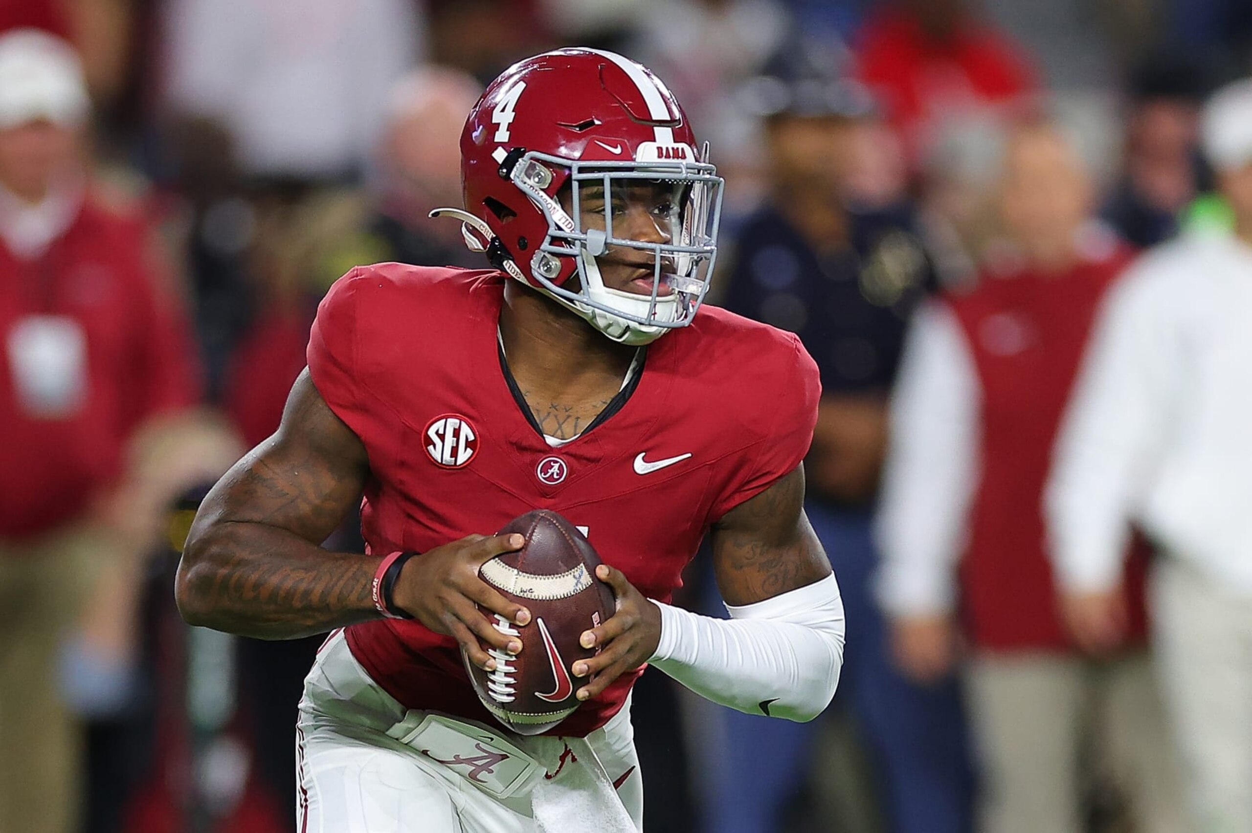 TUSCALOOSA, ALABAMA - NOVEMBER 04:  Jalen Milroe #4 of the Alabama Crimson Tide looks to pass against the LSU Tigers during the first quarter at Bryant-Denny Stadium on November 04, 2023 in Tuscaloosa, Alabama.  (Photo by Kevin C. Cox/Getty Images)