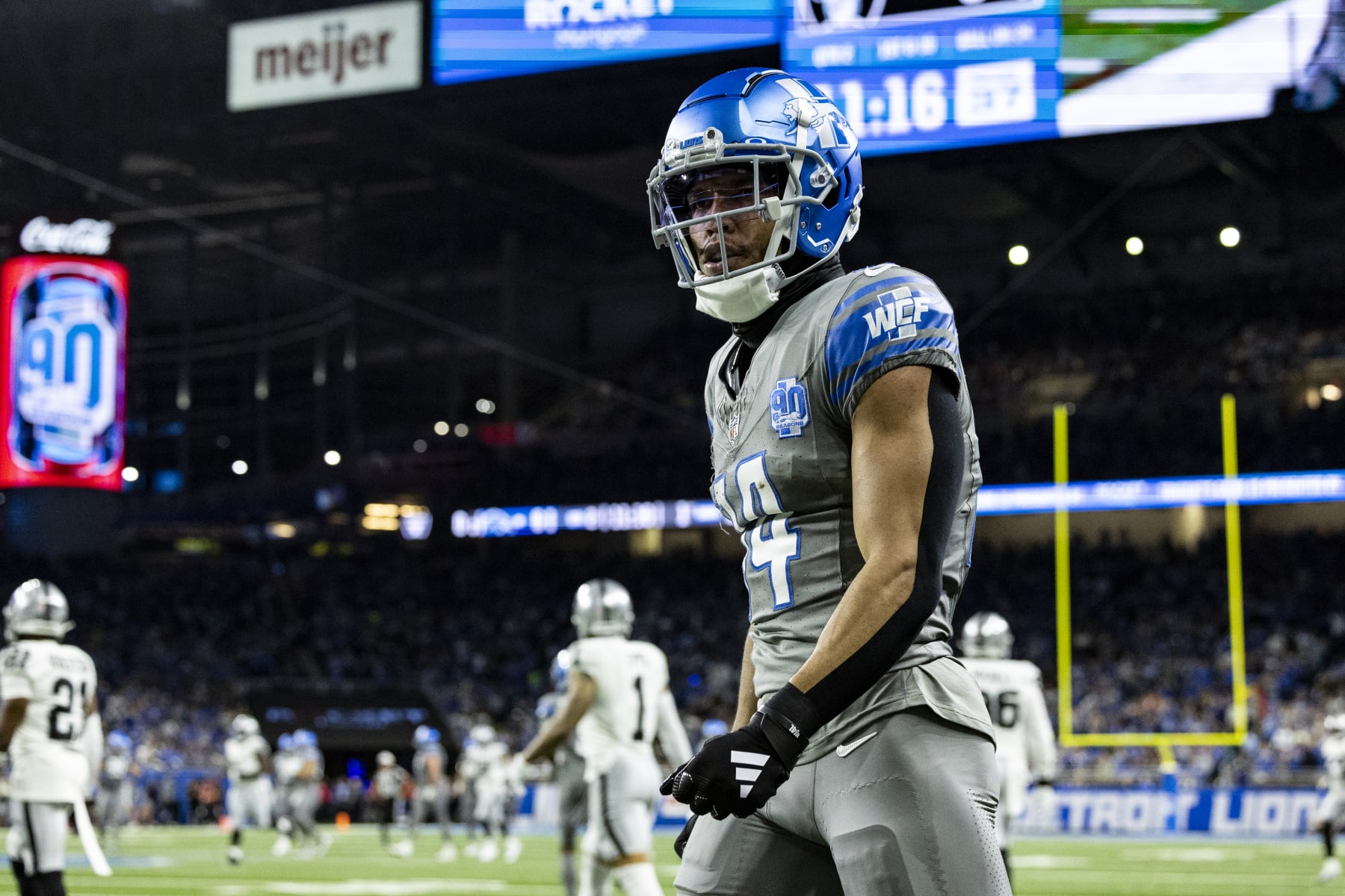 DETROIT, MICHIGAN - OCTOBER 30: Amon-Ra St. Brown #14 of the Detroit Lions looks down field after getting a first down during the game against the Las Vegas Raiders at Ford Field on October 30, 2023 in Detroit, Michigan. The Lions beat the Raiders 26-14. (Photo by Lauren Leigh Bacho/Getty Images)