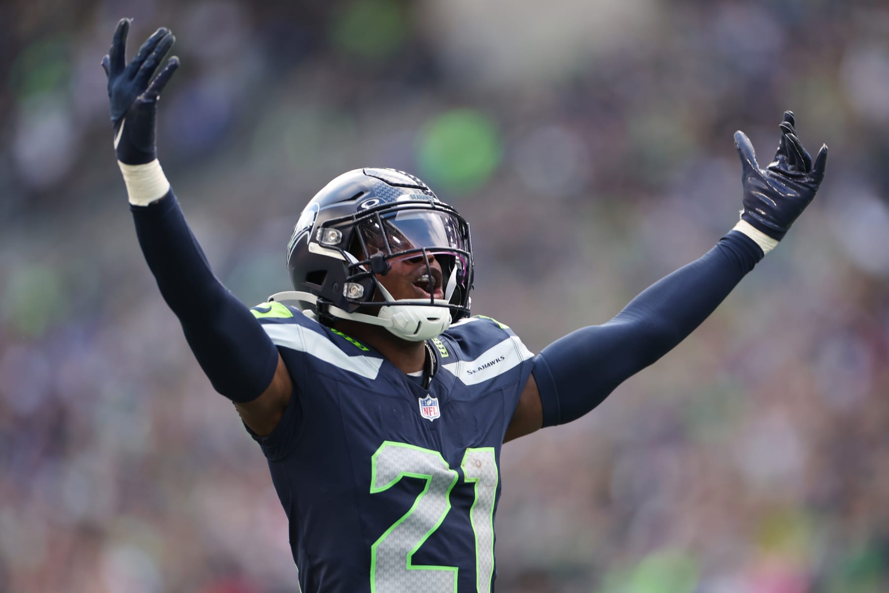 SEATTLE, WASHINGTON - OCTOBER 22: Devon Witherspoon #21 of the Seattle Seahawks celebrates after a sack in the fourth quarter of the game against the Arizona Cardinals at Lumen Field on October 22, 2023 in Seattle, Washington. (Photo by Steph Chambers/Getty Images)