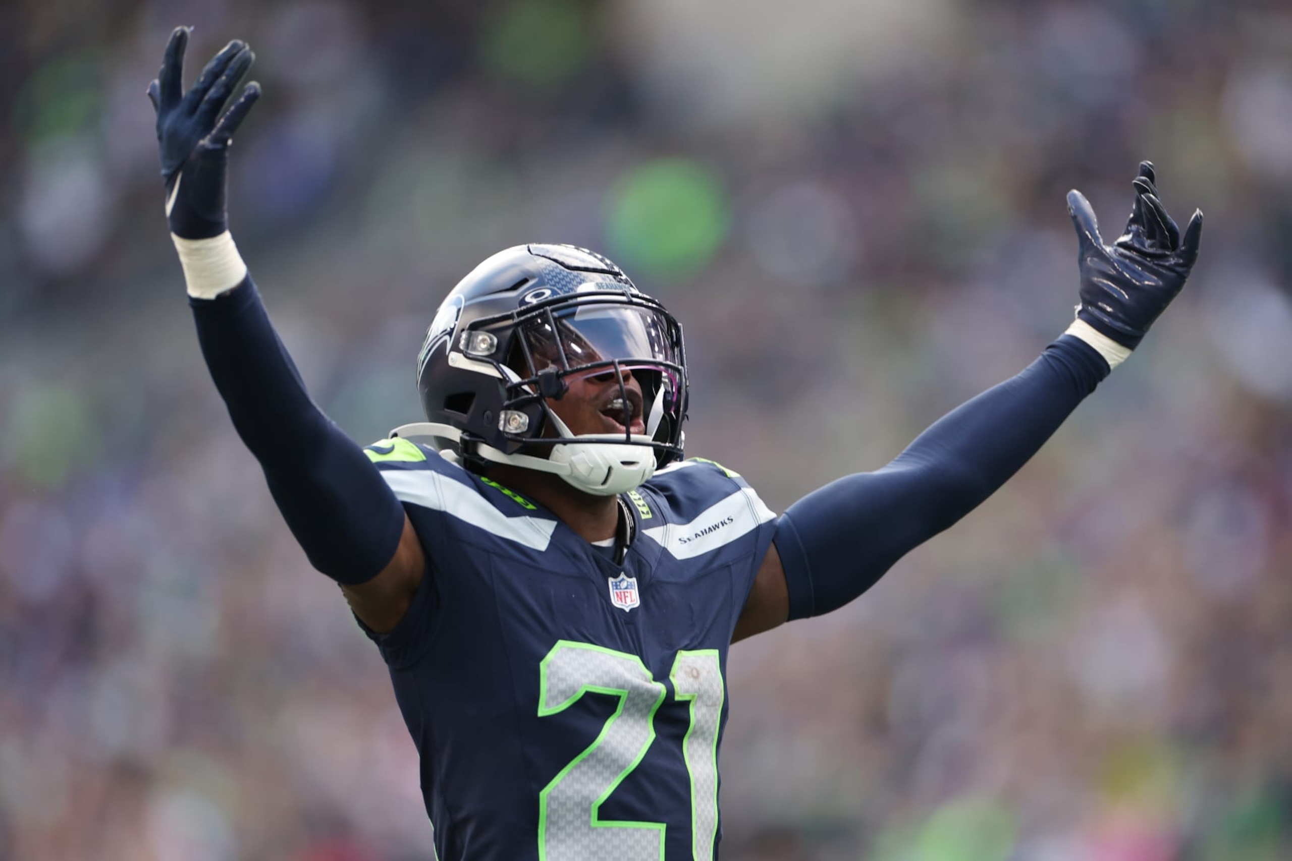 SEATTLE, WASHINGTON - OCTOBER 22: Devon Witherspoon #21 of the Seattle Seahawks celebrates after a sack in the fourth quarter of the game against the Arizona Cardinals at Lumen Field on October 22, 2023 in Seattle, Washington. (Photo by Steph Chambers/Getty Images)