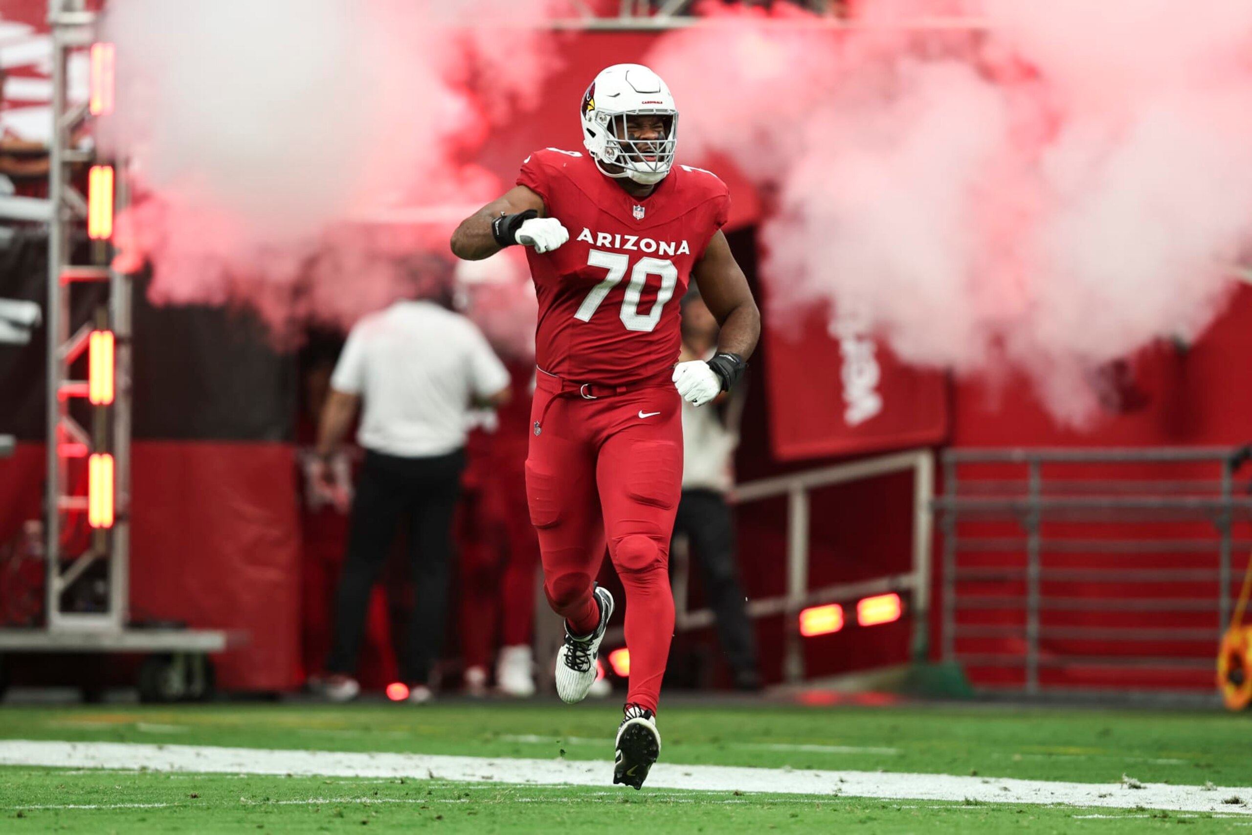 GLENDALE, ARIZONA - SEPTEMBER 24: Paris Johnson Jr. #70 of the Arizona Cardinals reacts as he takes the field prior to an NFL football game between the Arizona Cardinals and the Dallas Cowboys at State Farm Stadium on September 24, 2023 in Glendale, Arizona. (Photo by Michael Owens/Getty Images)