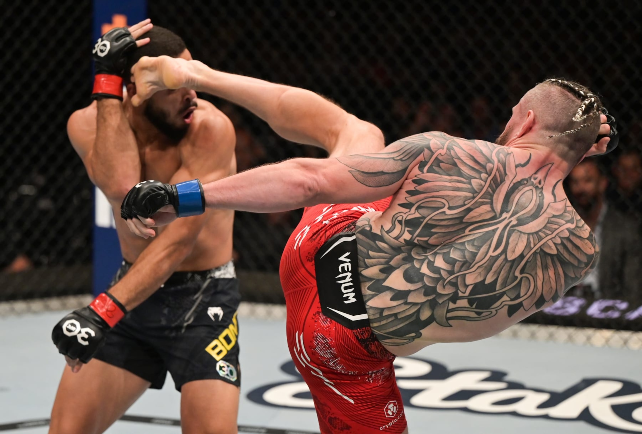 SAO PAULO, BRAZIL - NOVEMBER 04: (R-L) Nicolas Dalby of Denmark kicks Gabriel Bonfim of Brazil in a welterweight fight during the UFC Fight Night event at Ibirapuera Gymnasium on November 04, 2023 in Sao Paulo, Brazil. (Photo by Pedro Vilela/Zuffa LLC via Getty Images)