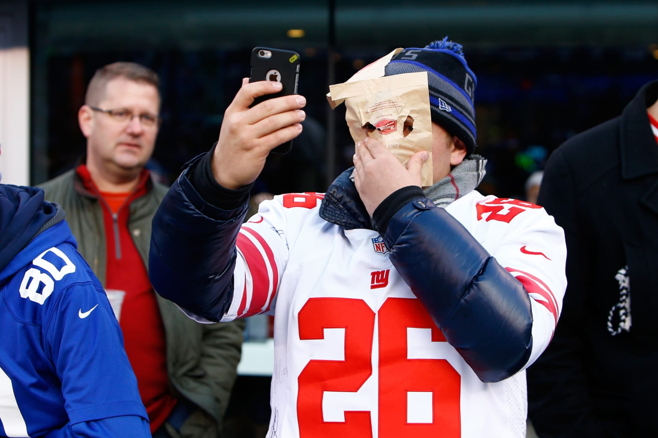 EAST RUTHERFORD, NJ - DECEMBER 20: A New York Giants fan takes a selfie with a paper bag over his face during the game between the Carolina Panthers and the New York Giants at MetLife Stadium on December 20, 2015 in East Rutherford, New Jersey. (Photo by Michael Reaves/Getty Images) EAST RUTHERFORD, NJ - DECEMBER 20: A New York Giants fan takes a selfie with a paper bag over his face during the game between the Carolina Panthers and the New York Giants at MetLife Stadium on December 20, 2015 in East Rutherford, New Jersey. (Photo by Michael Reaves/Getty Images)