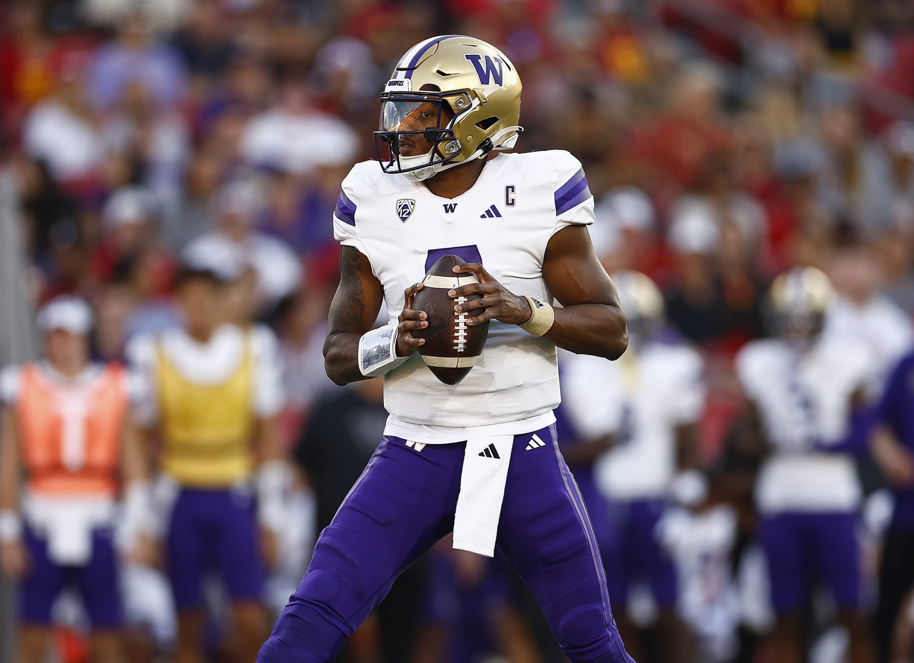 LOS ANGELES, CALIFORNIA - NOVEMBER 04:  Michael Penix Jr. #9 of the Washington Huskies throws against the USC Trojans in the first quarter at United Airlines Field at the Los Angeles Memorial Coliseum on November 04, 2023 in Los Angeles, California. (Photo by Ronald Martinez/Getty Images)