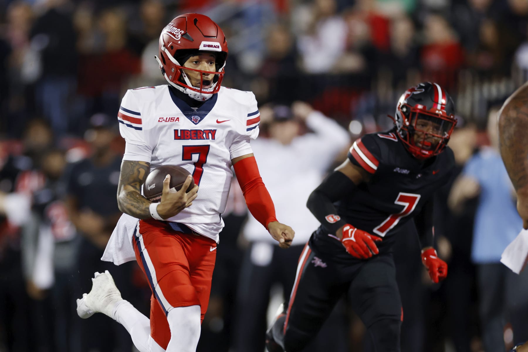 BOWLING GREEN, KY - OCTOBER 24: Liberty Flames quarterback Kaidon Salter (7) runs the ball for a 20-yard touchdown during a college football game against the Western Kentucky Hilltoppers on October 24, 2023 at Houchens Industries - L. T. Smith Stadium in Bowling Green, Kentucky. (Photo by Joe Robbins/Icon Sportswire via Getty Images)