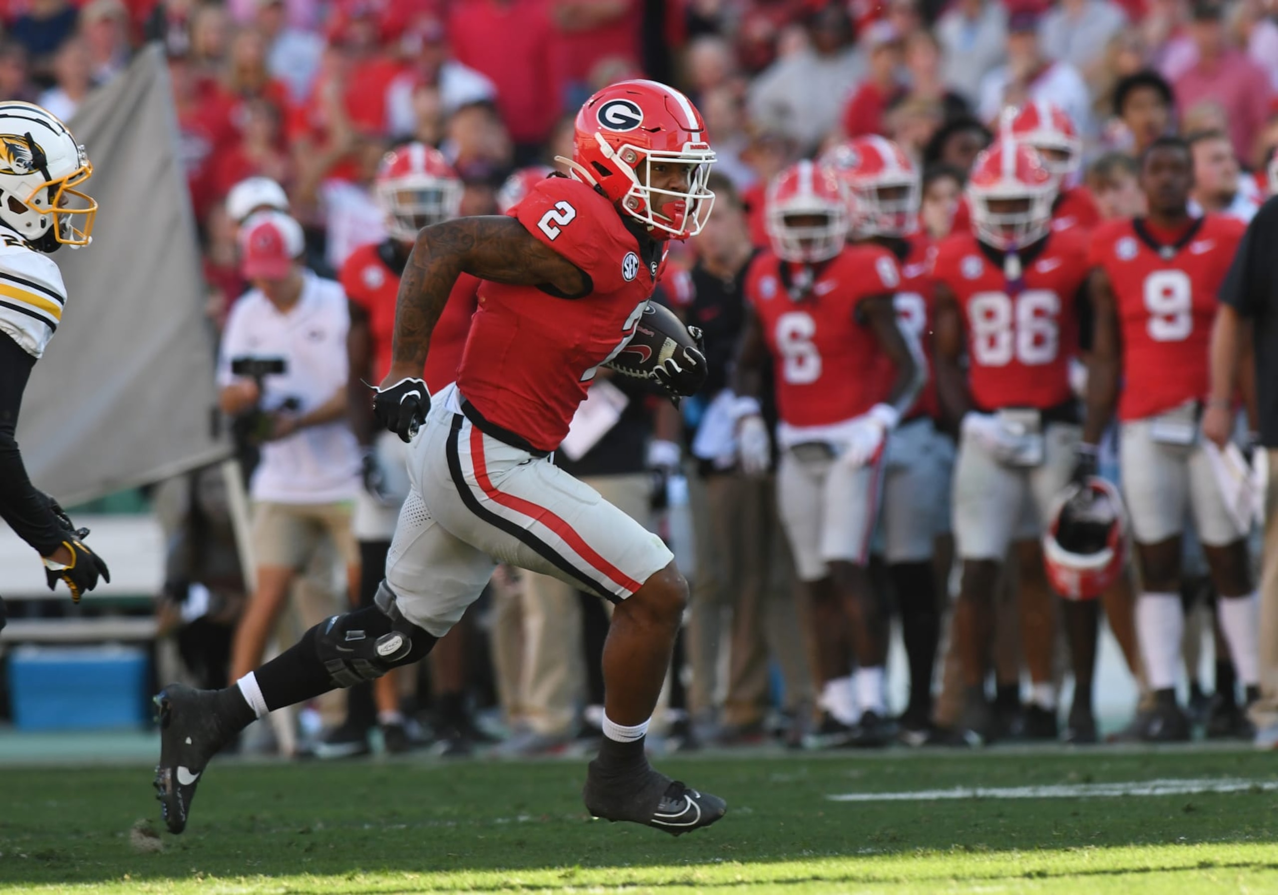 ATHENS, GA - NOVEMBER 04: Georgia Bulldogs Running Back Kendall Milton (2) rushes the ball during the college football game between the Missouri Tigers and the Georgia Bulldogs on November 04, 2023, at Sanford Stadium in Athens, GA. (Photo by Jeffrey Vest/Icon Sportswire via Getty Images)