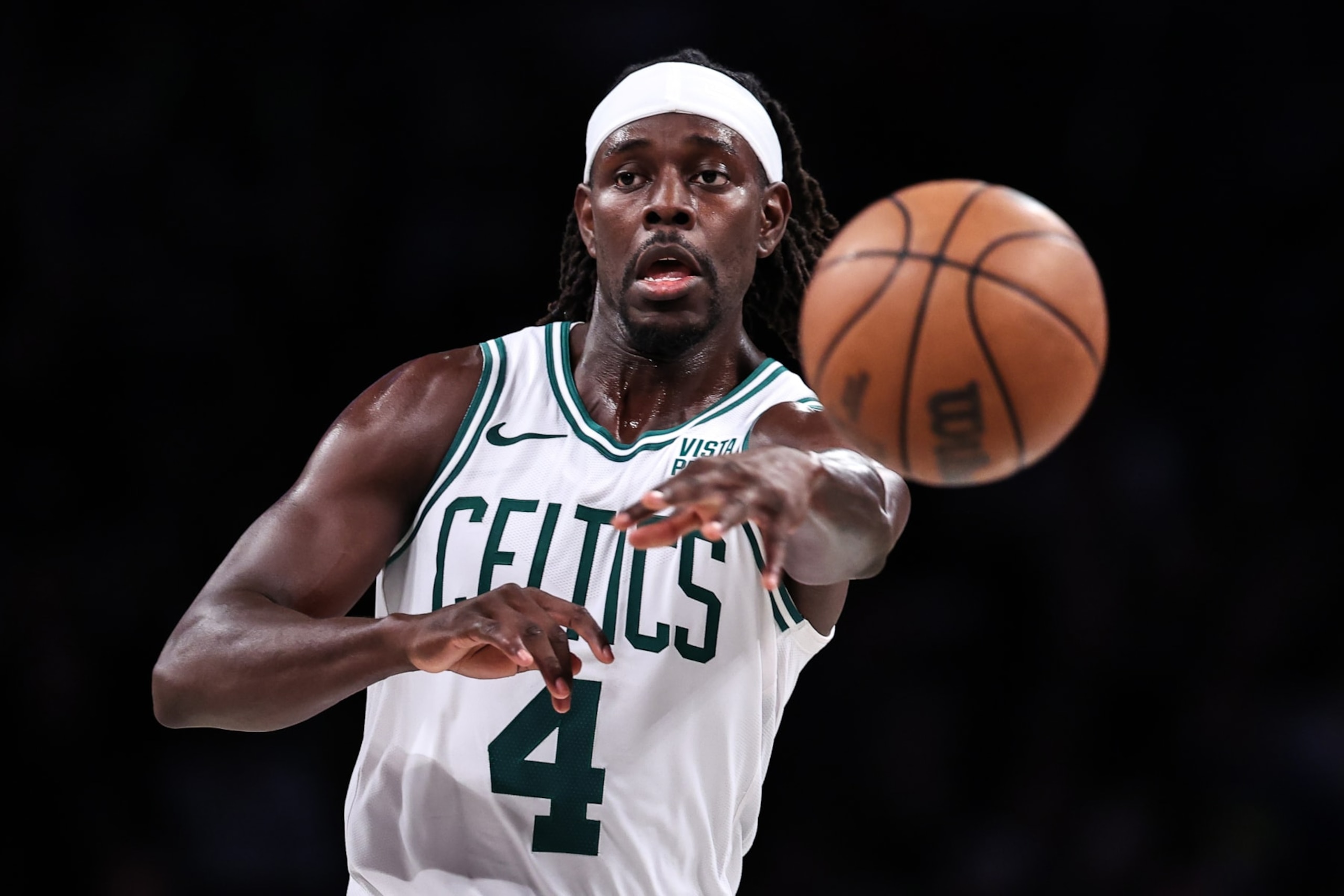 NEW YORK, NEW YORK - NOVEMBER 04: Jrue Holiday #4 of the Boston Celtics passes the ball during the third quarter of the game against the Brooklyn Nets at Barclays Center on November 04, 2023 in New York City. NOTE TO USER: User expressly acknowledges and agrees that, by downloading and or using this photograph, User is consenting to the terms and conditions of the Getty Images License Agreement. (Photo by Dustin Satloff/Getty Images)