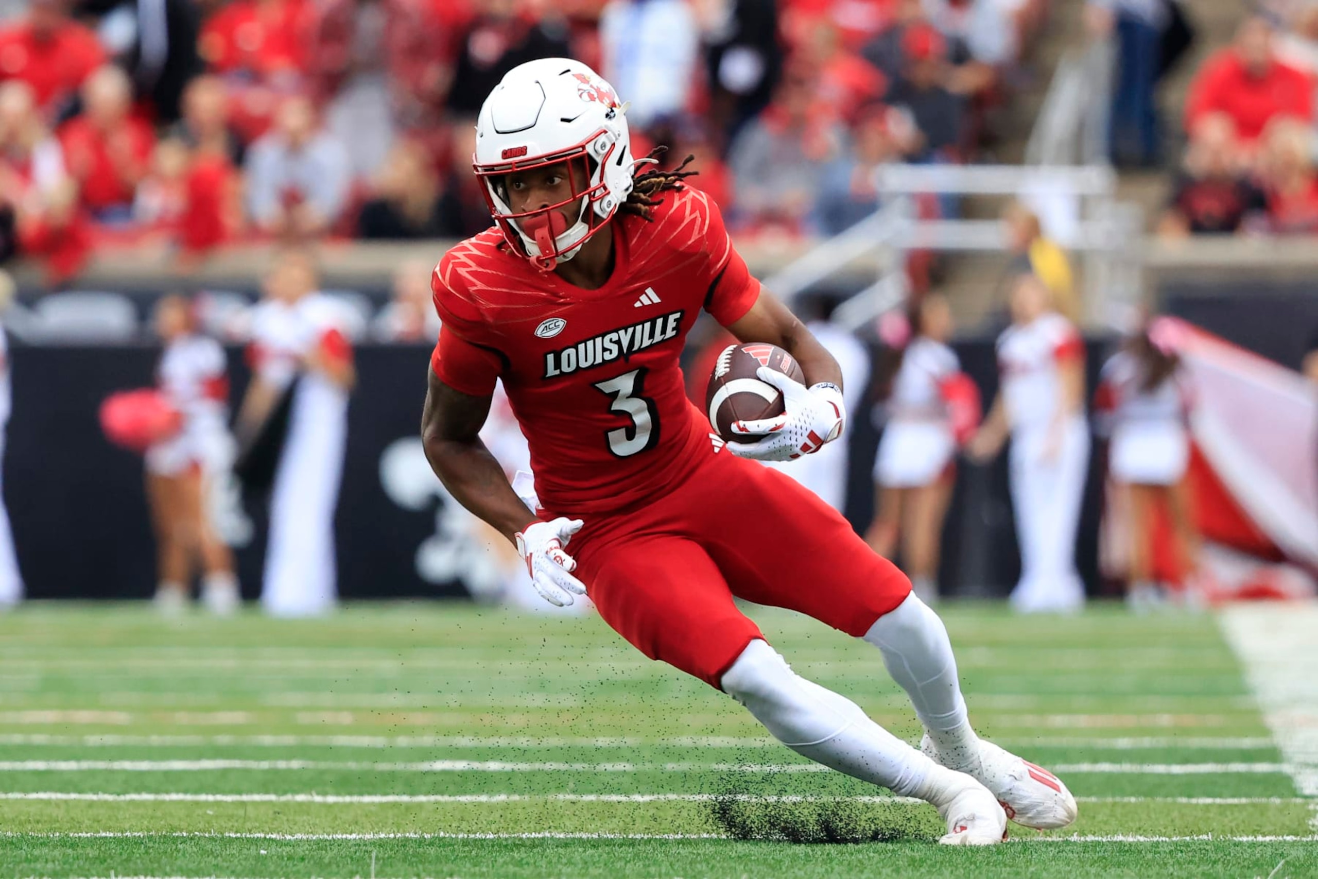 LOUISVILLE, KENTUCKY - OCTOBER 28: Kevin Coleman #3 of the Louisville Cardinals  runs the ball after a catch in the game against the Duke Blue Devils at Cardinal Stadium on October 28, 2023 in Louisville, Kentucky. (Photo by Justin Casterline/Getty Images)