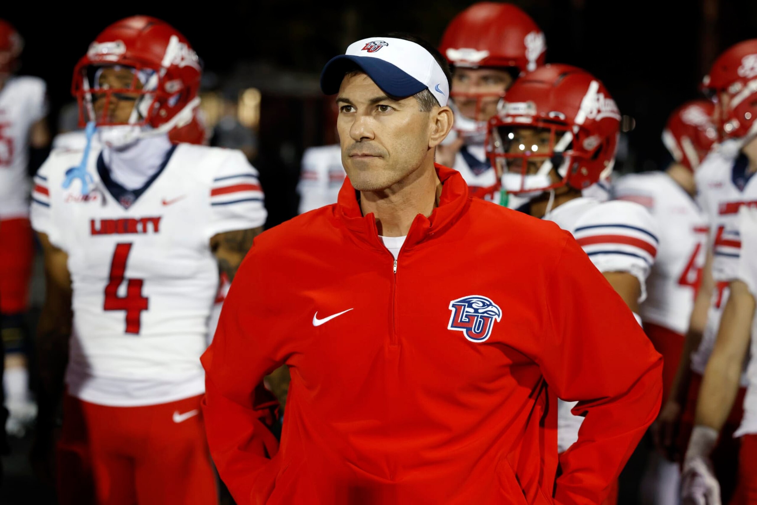 BOWLING GREEN, KY - OCTOBER 24: Liberty Flames head coach Jamey Chadwell stands with his team before a college football game against the Western Kentucky Hilltoppers on October 24, 2023 at Houchens Industries - L. T. Smith Stadium in Bowling Green, Kentucky. (Photo by Joe Robbins/Icon Sportswire via Getty Images)