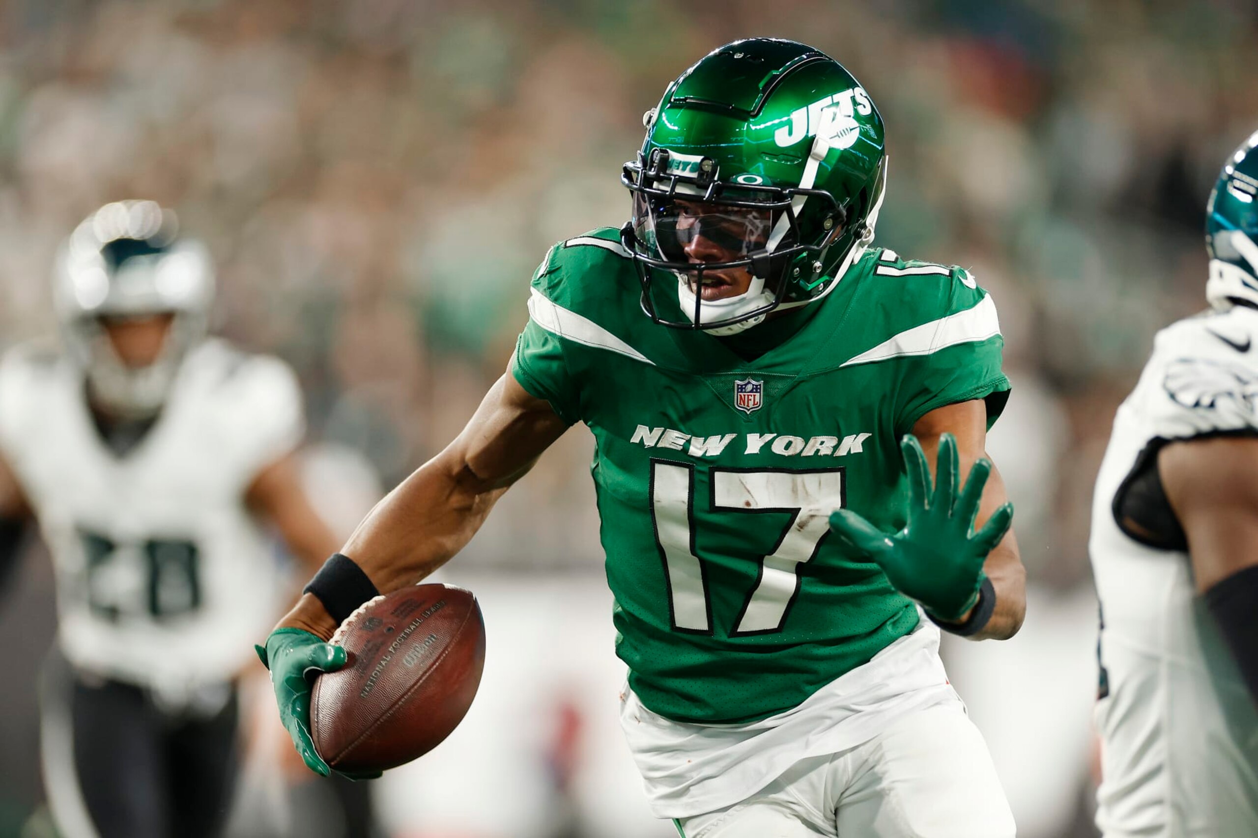 EAST RUTHERFORD, NEW JERSEY - OCTOBER 15: Garrett Wilson #17 of the New York Jets runs the ball during the second half in the game against the Philadelphia Eagles at MetLife Stadium on October 15, 2023 in East Rutherford, New Jersey. (Photo by Sarah Stier/Getty Images)